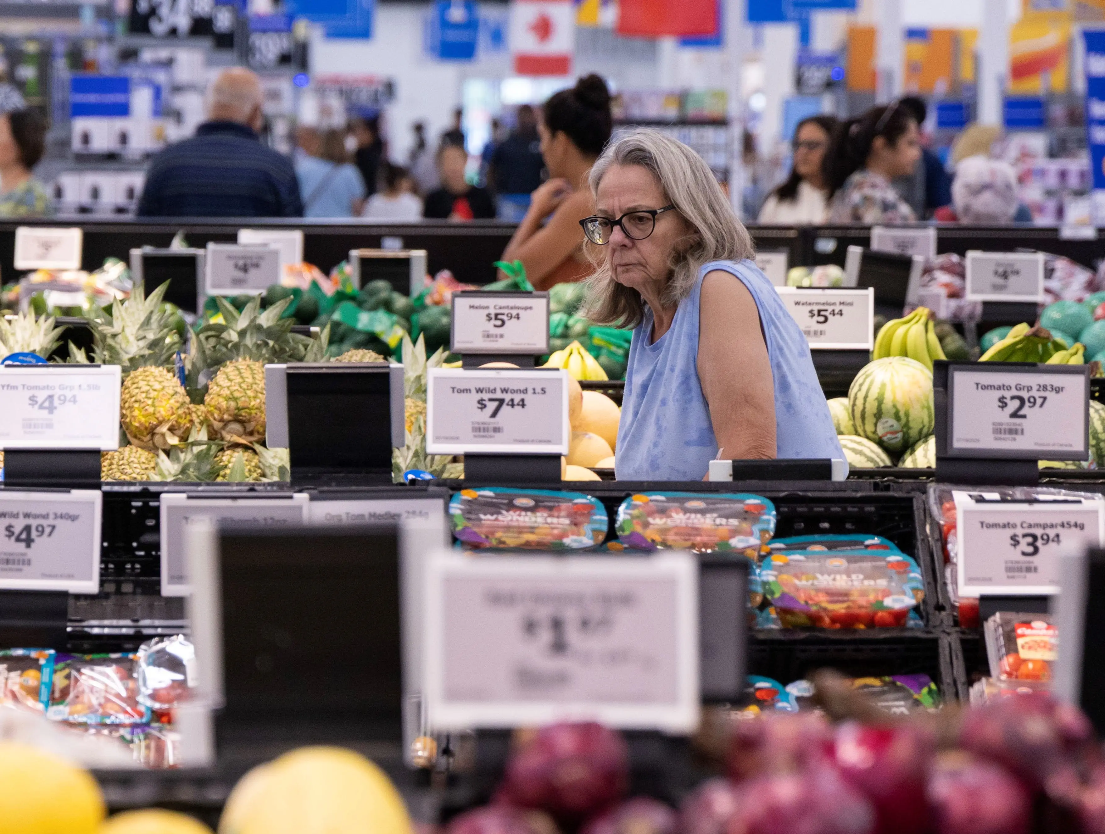A customer shops at a Walmart store in Toronto, Canada, July 20, 2026