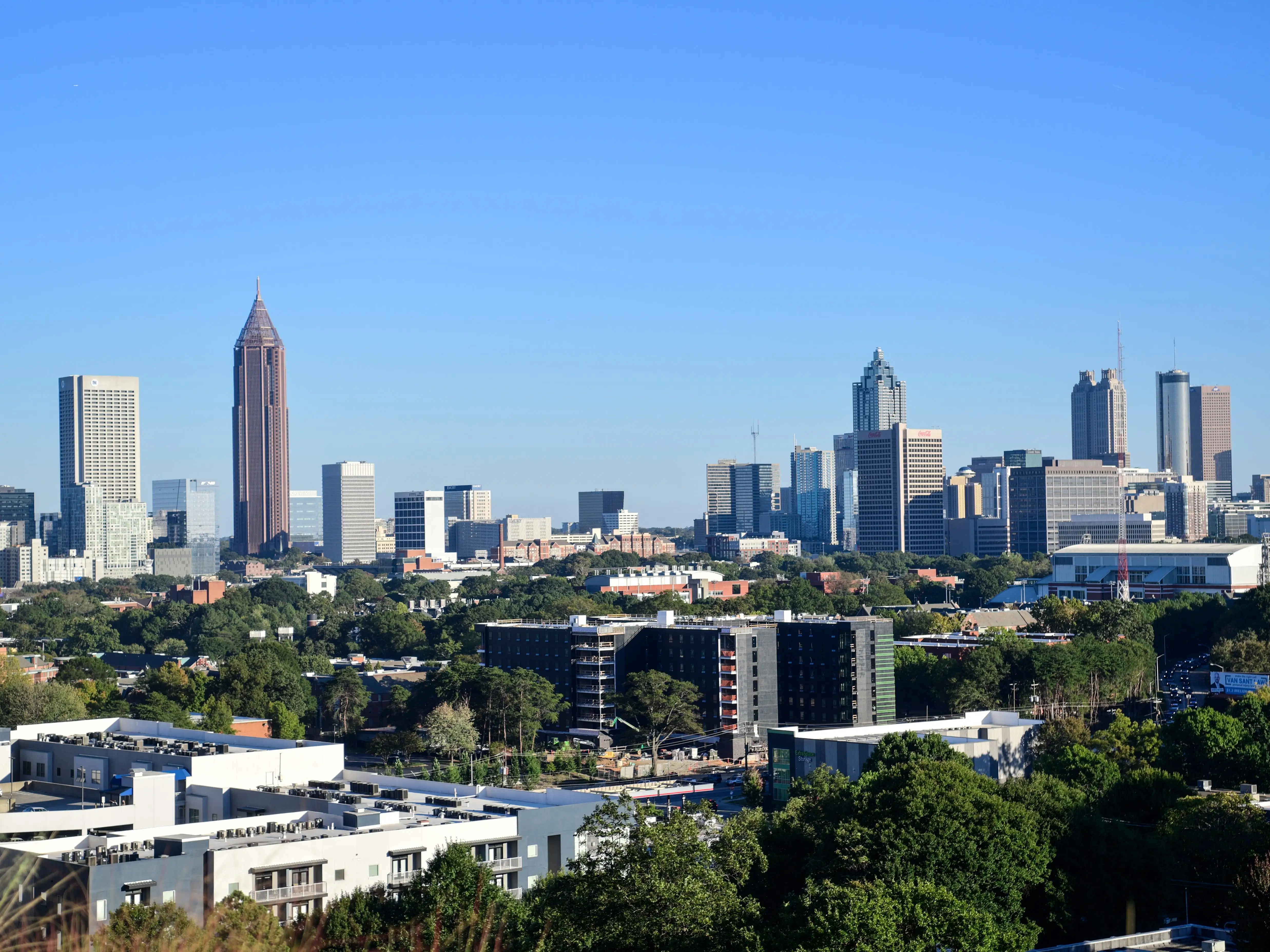A photo of a city skyline during the day.