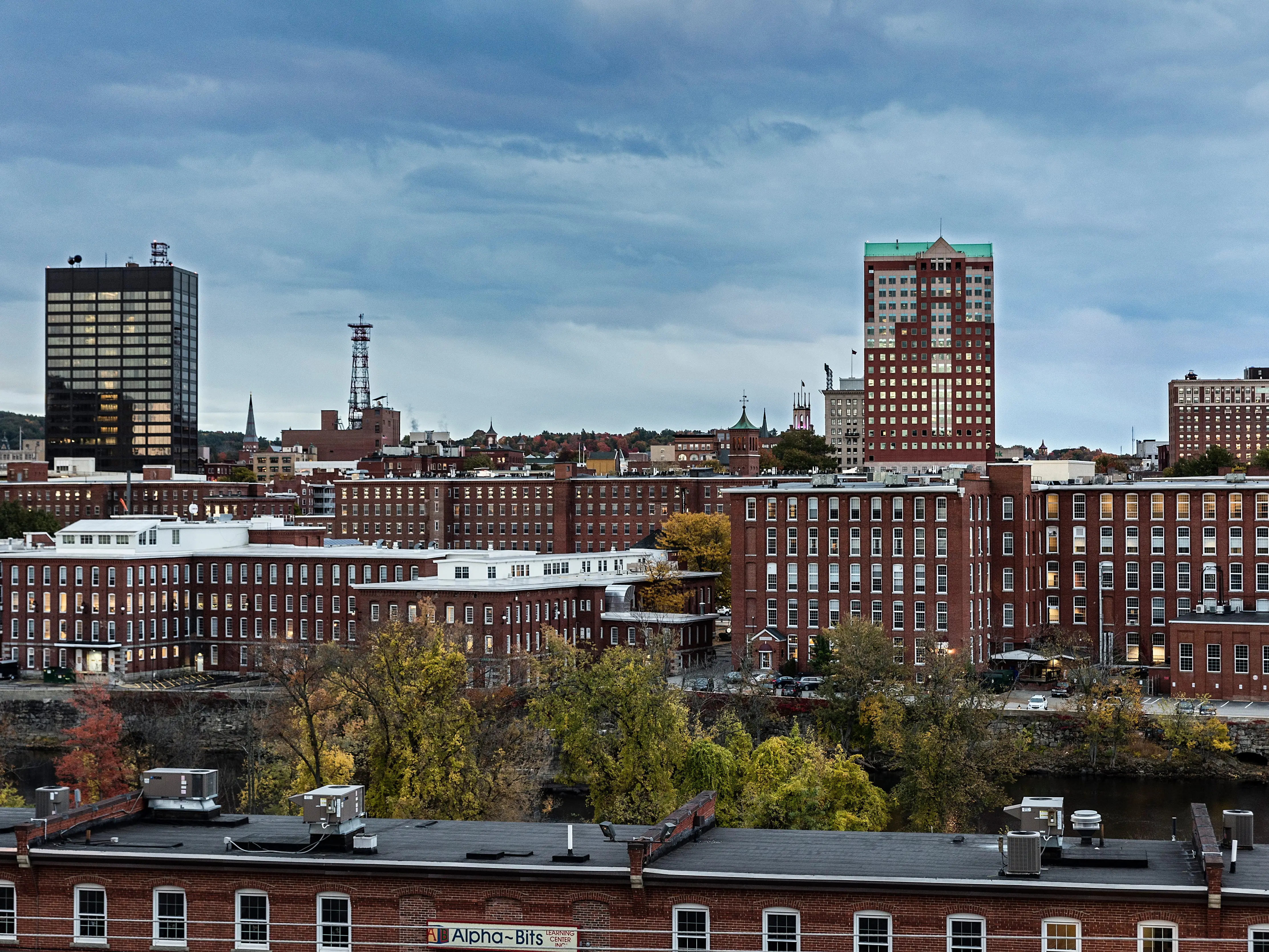 A photo of a city filled with red brick buildings.