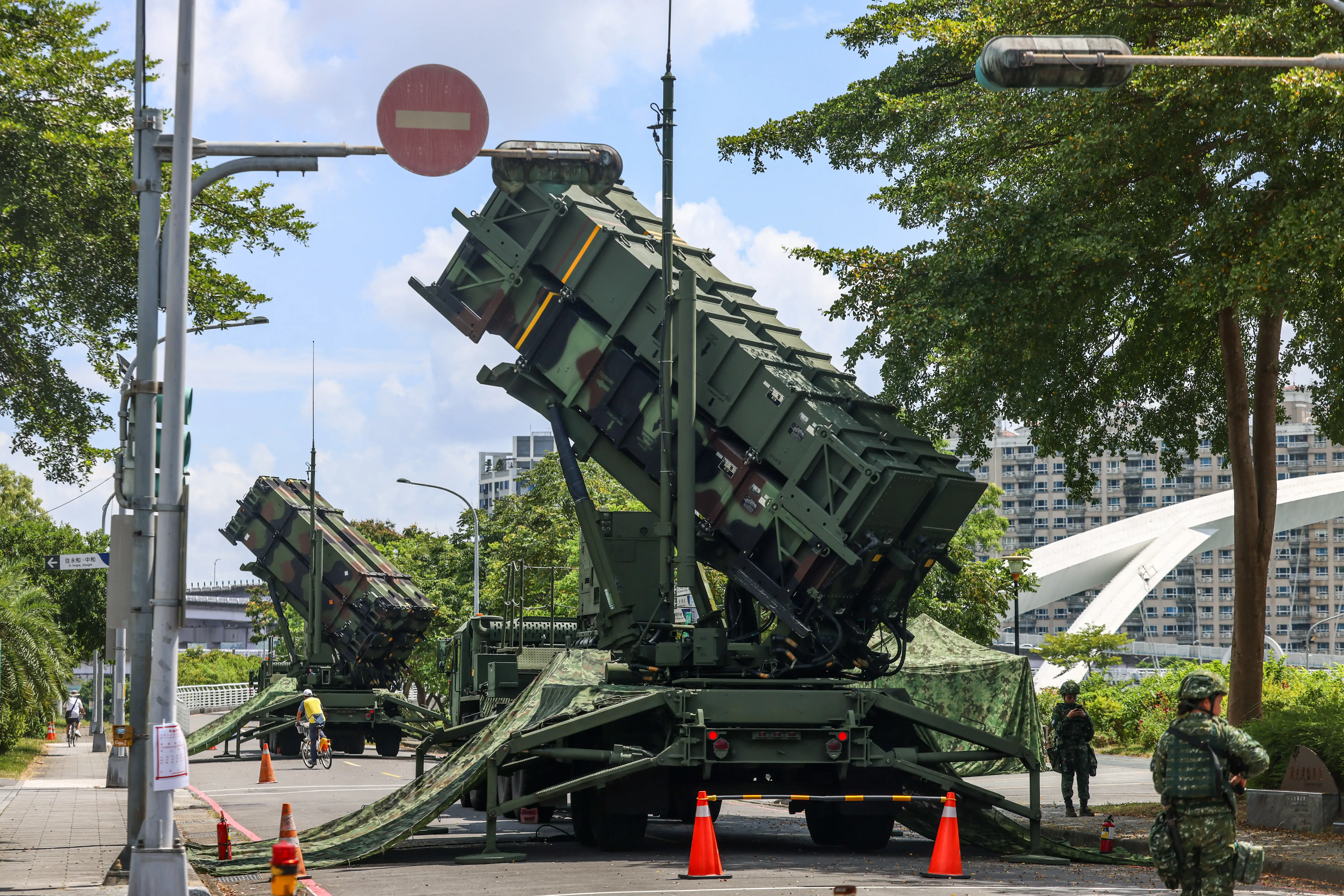 Two Taiwanese Patriot batteries are deployed in a park.