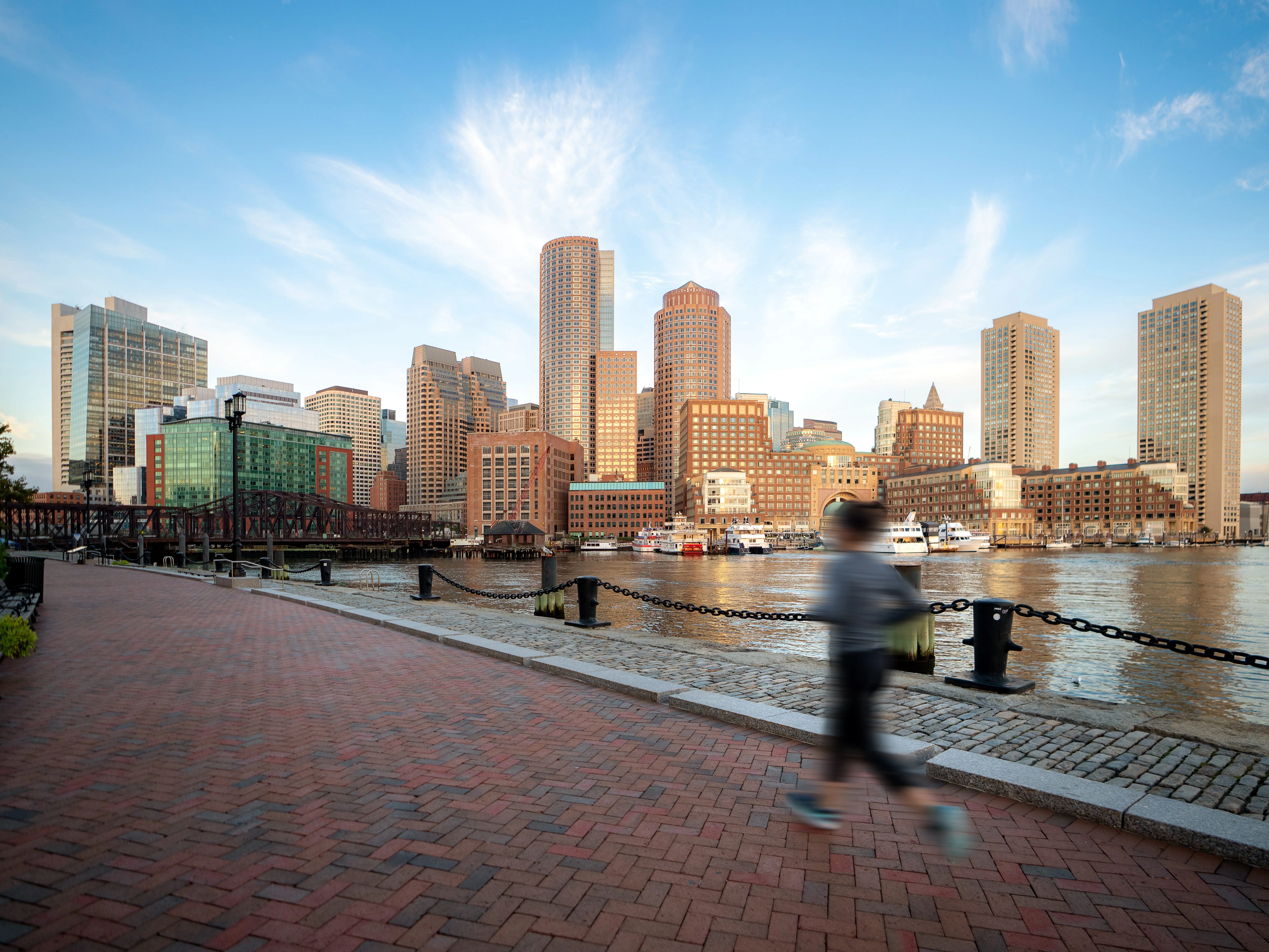 A person running near Boston Harbor