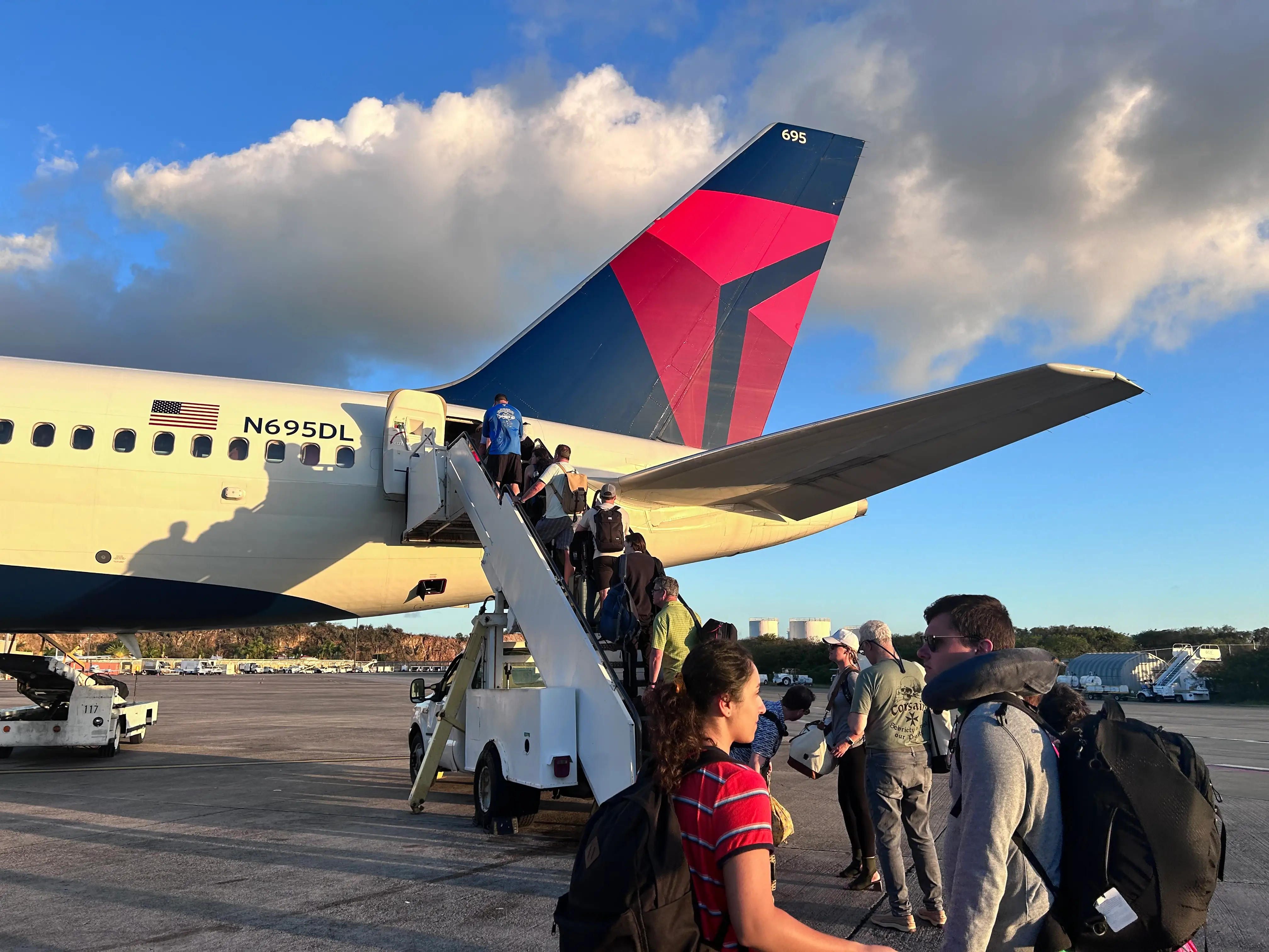 People boarding a plane.