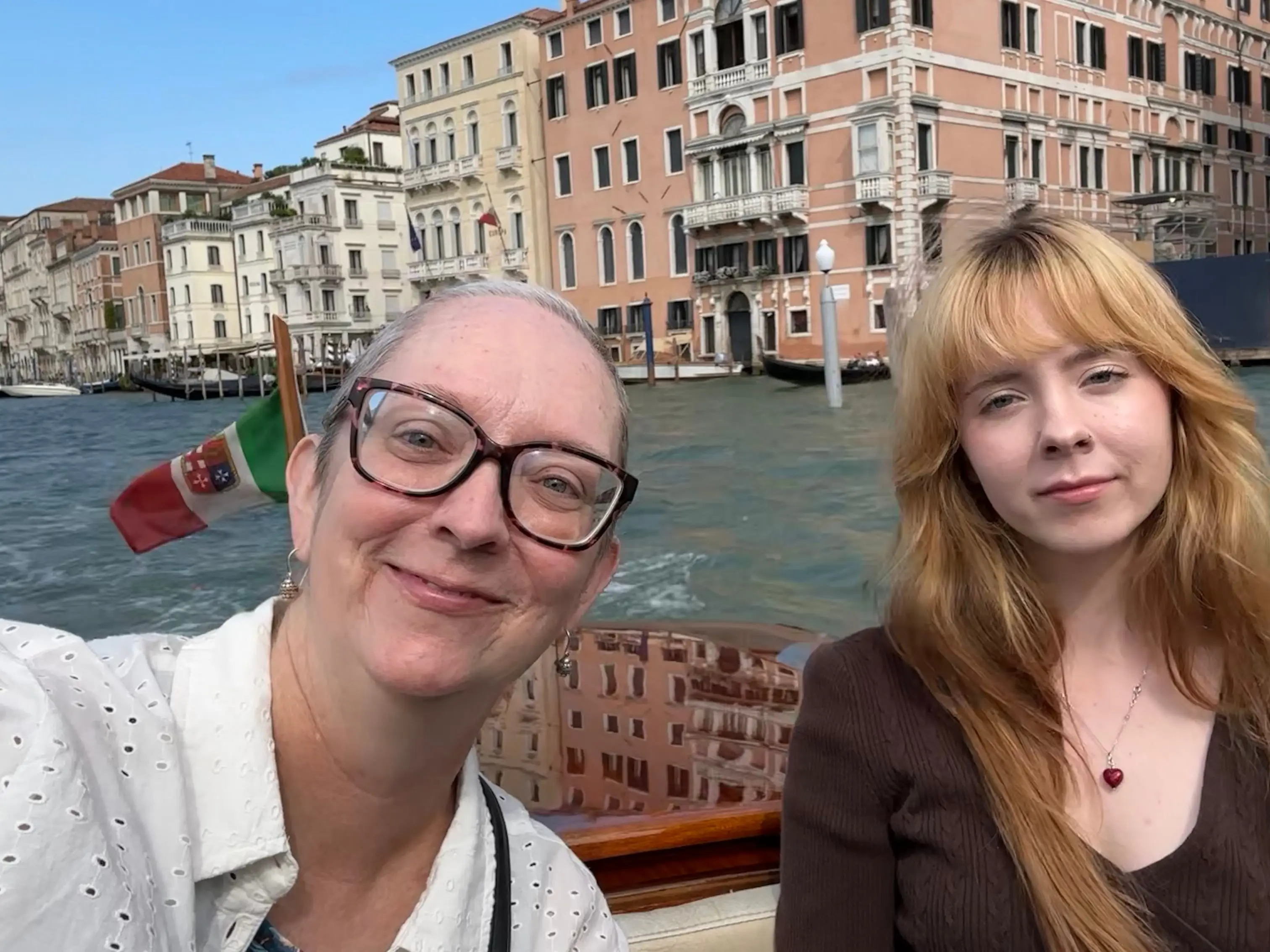 The author and her daughter ride through the canals on Venice.