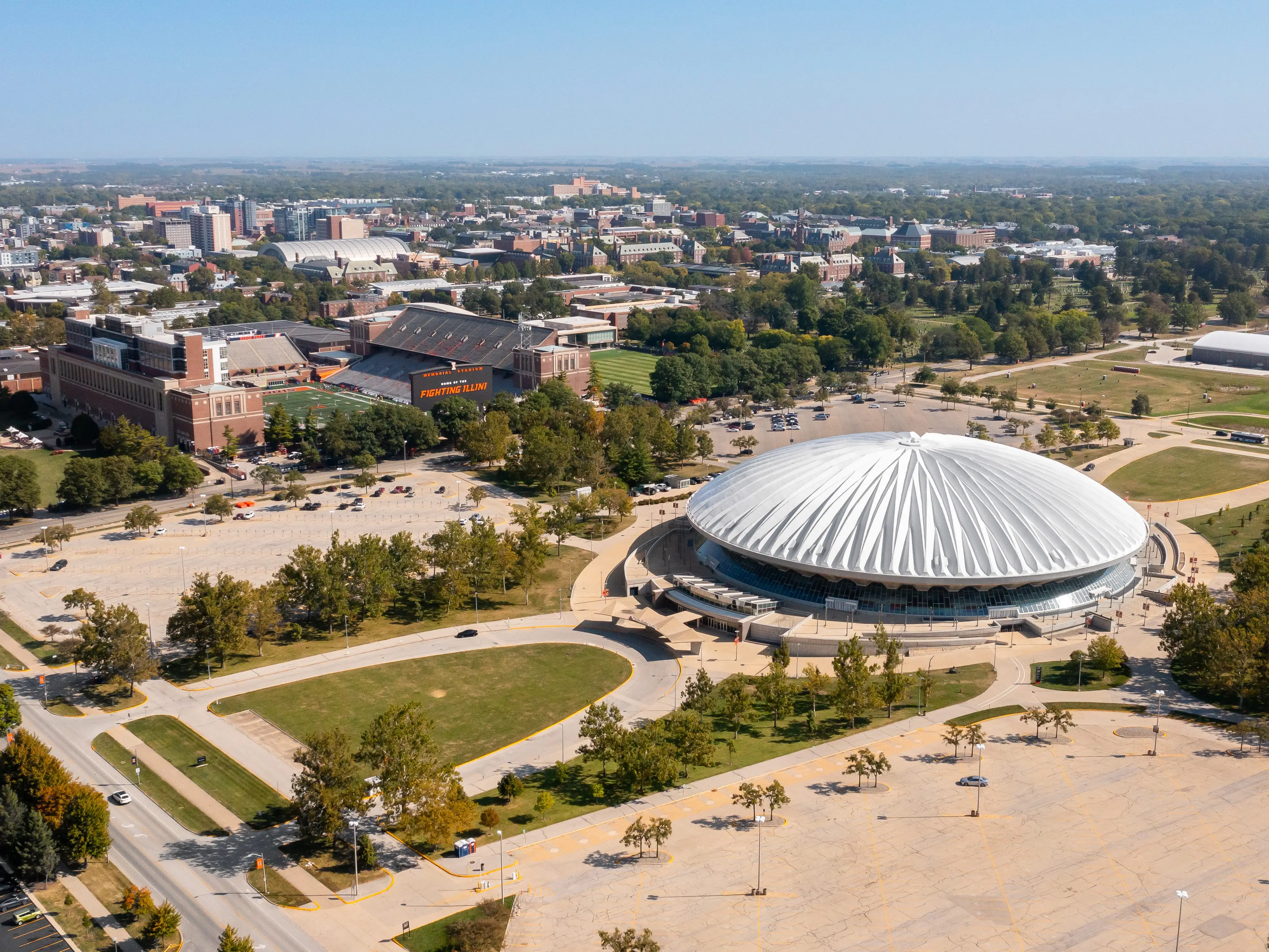 Champaign, IL, USA - September 18, 2024: An aerial view of The Memorial Stadium and State Farm Center at the University of Illinois for the Fighting Illini sports teams and events.