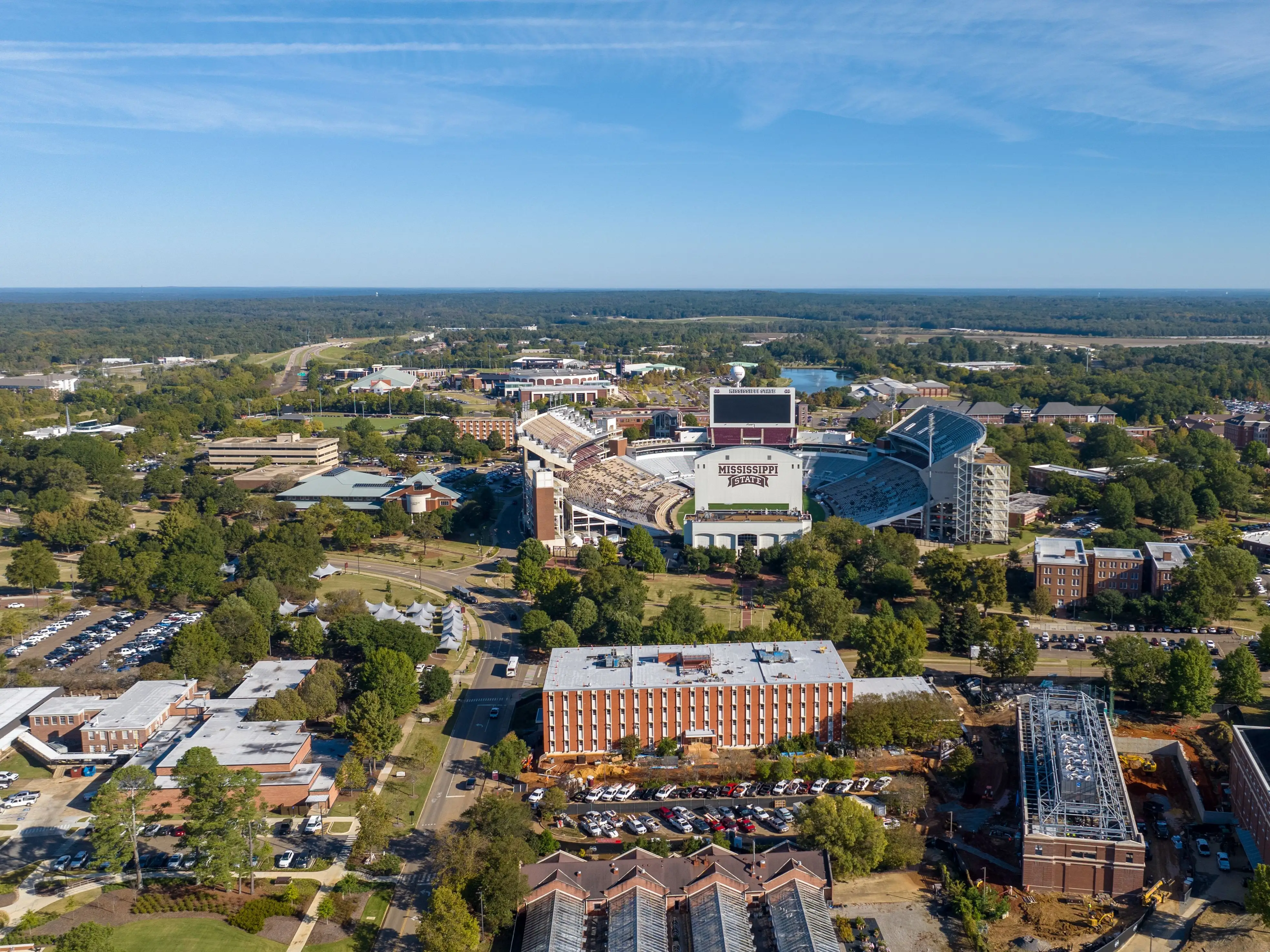 Starkville, United States — October 24, 2025: Drone shot above Mississippi State University campus with Davis Wade Stadium at center.