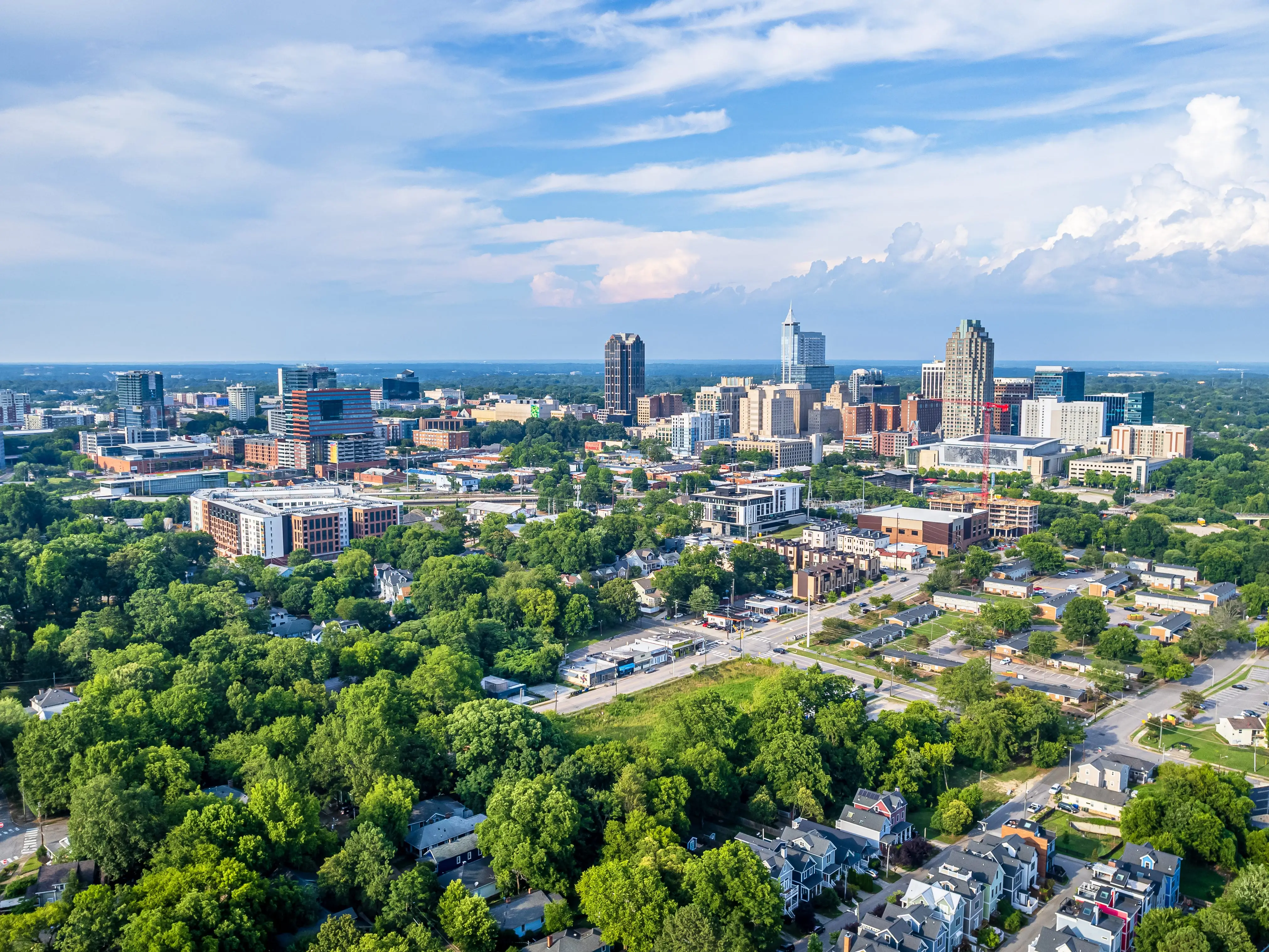 View of downtown Raleigh, North Carolina with blue sky background.