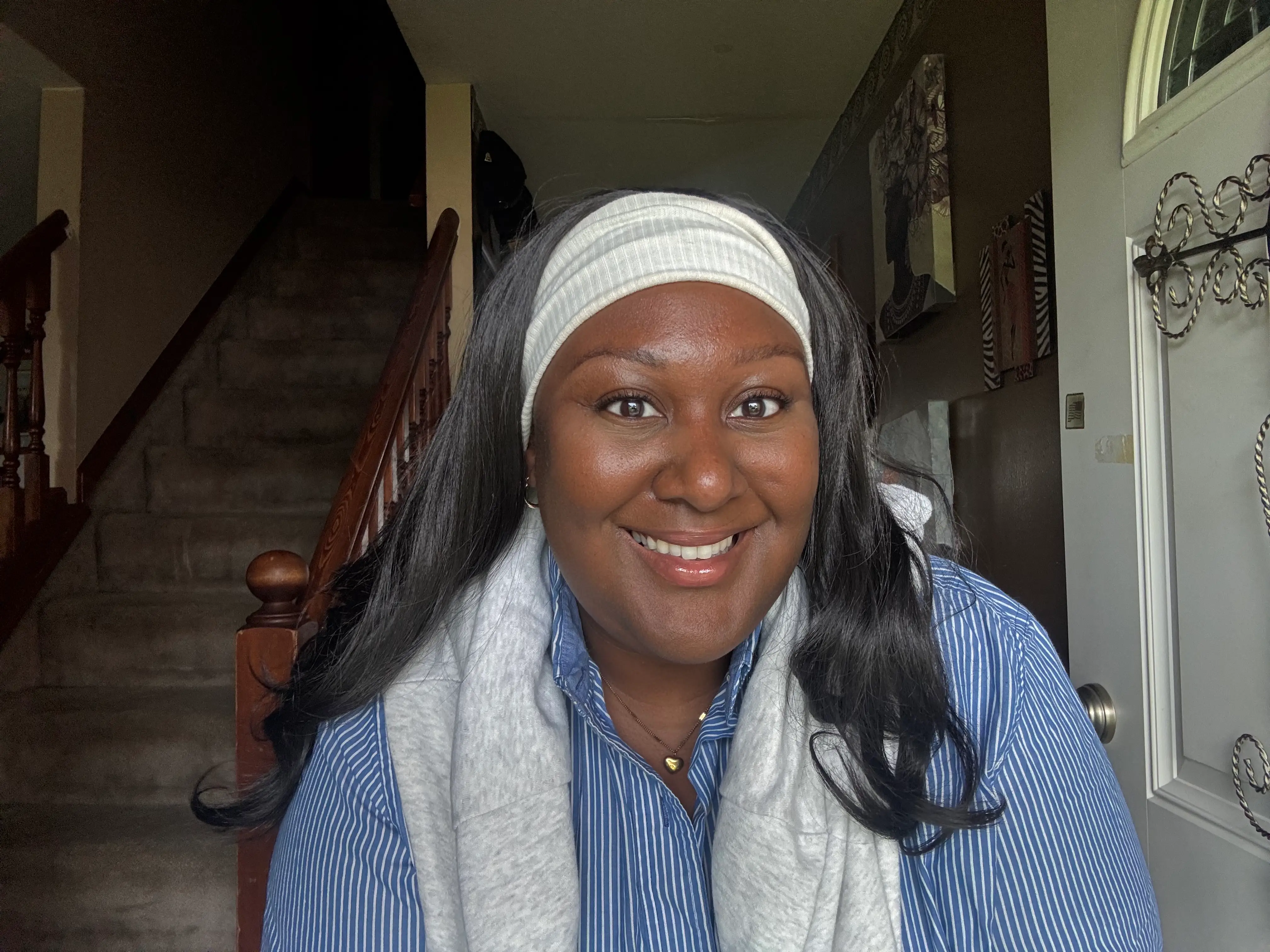 Woman in headband smiling