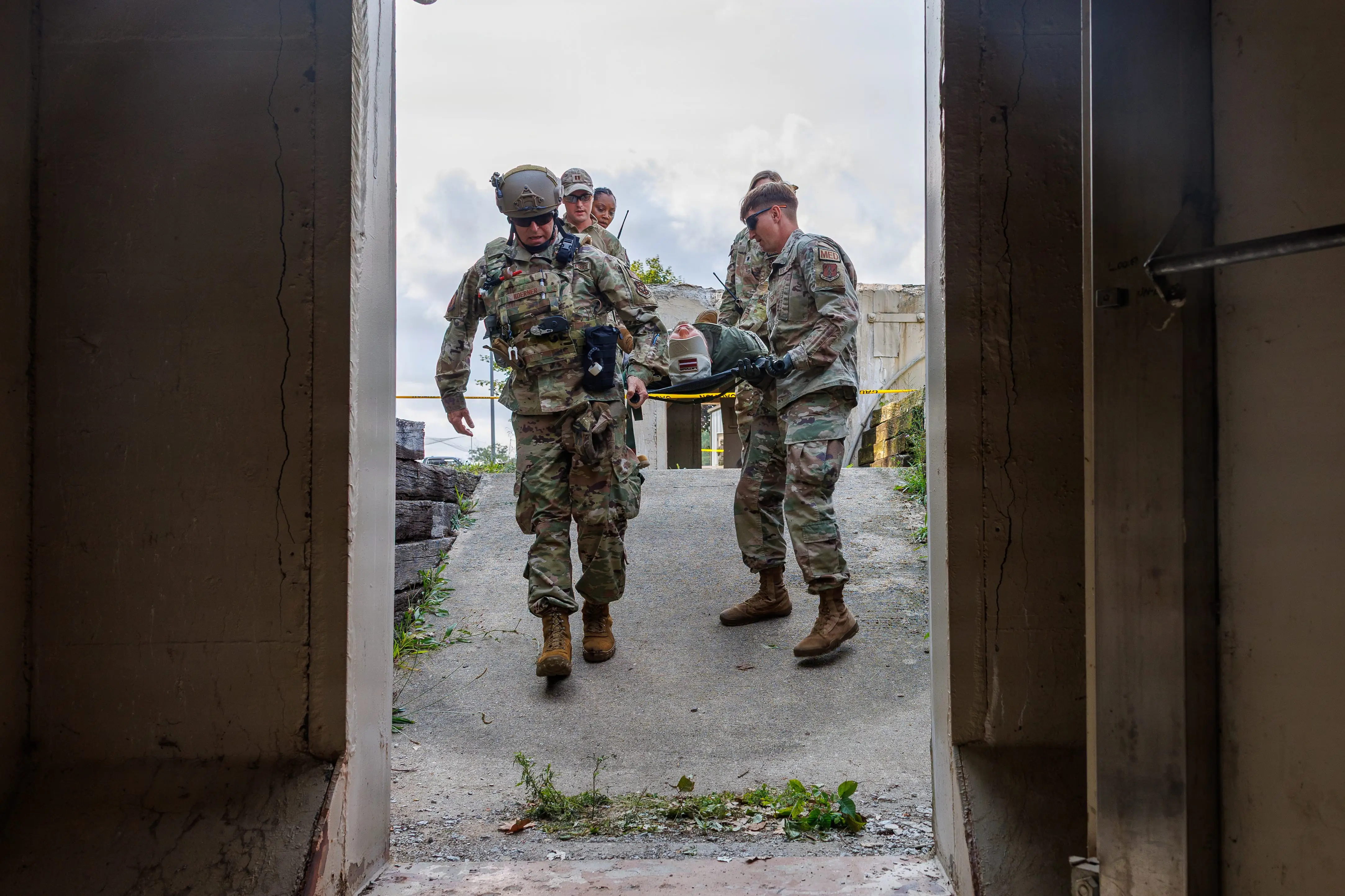 Air Force medical troops simulate a patient evacuation during a training event in Michigan, Aug. 10, 2026.