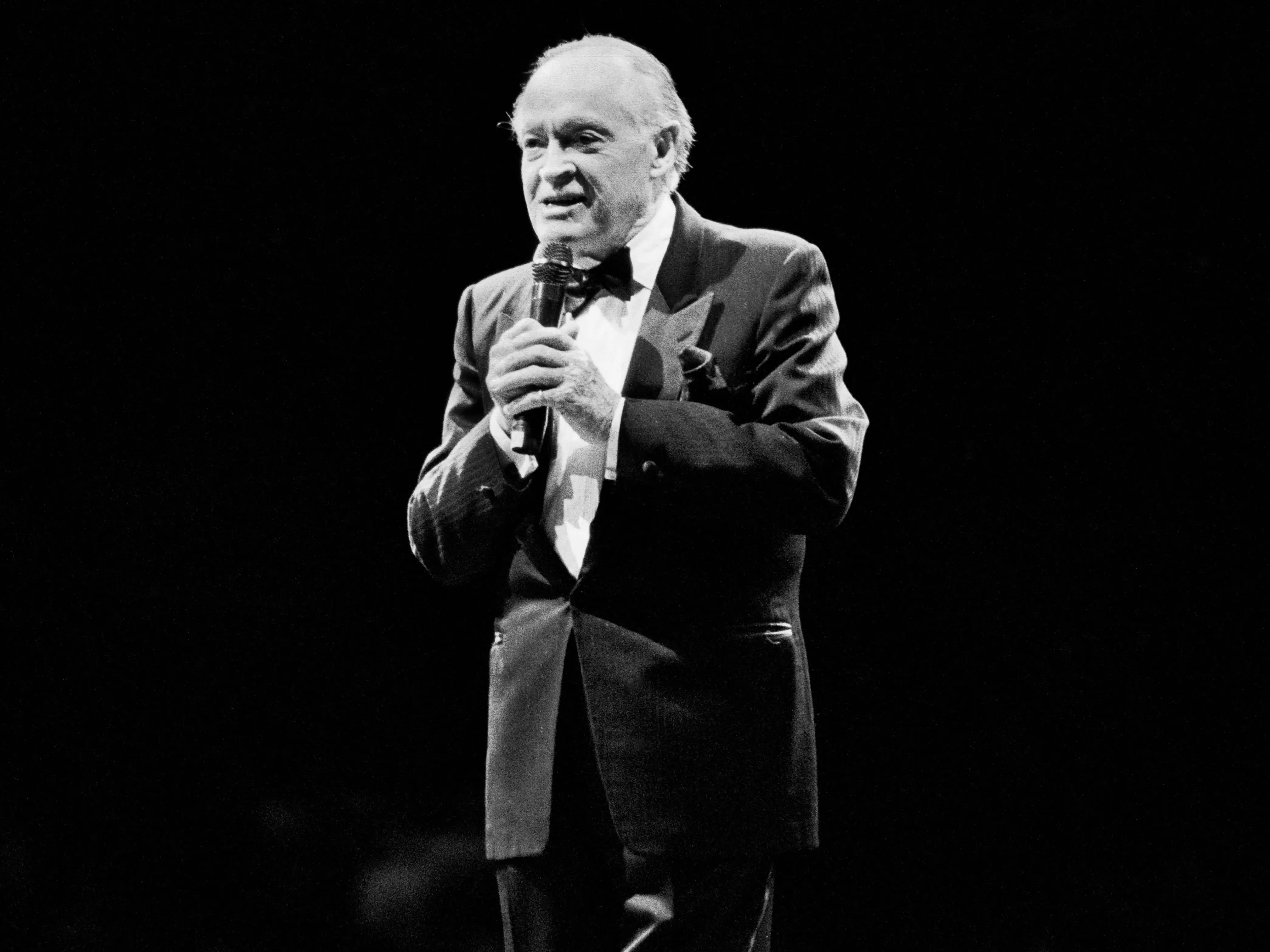 British-born American actor and comedian Bob Hope (born Leslie Hope, 1903 - 2003) performs onstage at Madison Square Garden, New York, New York, October 1, 1989. T
