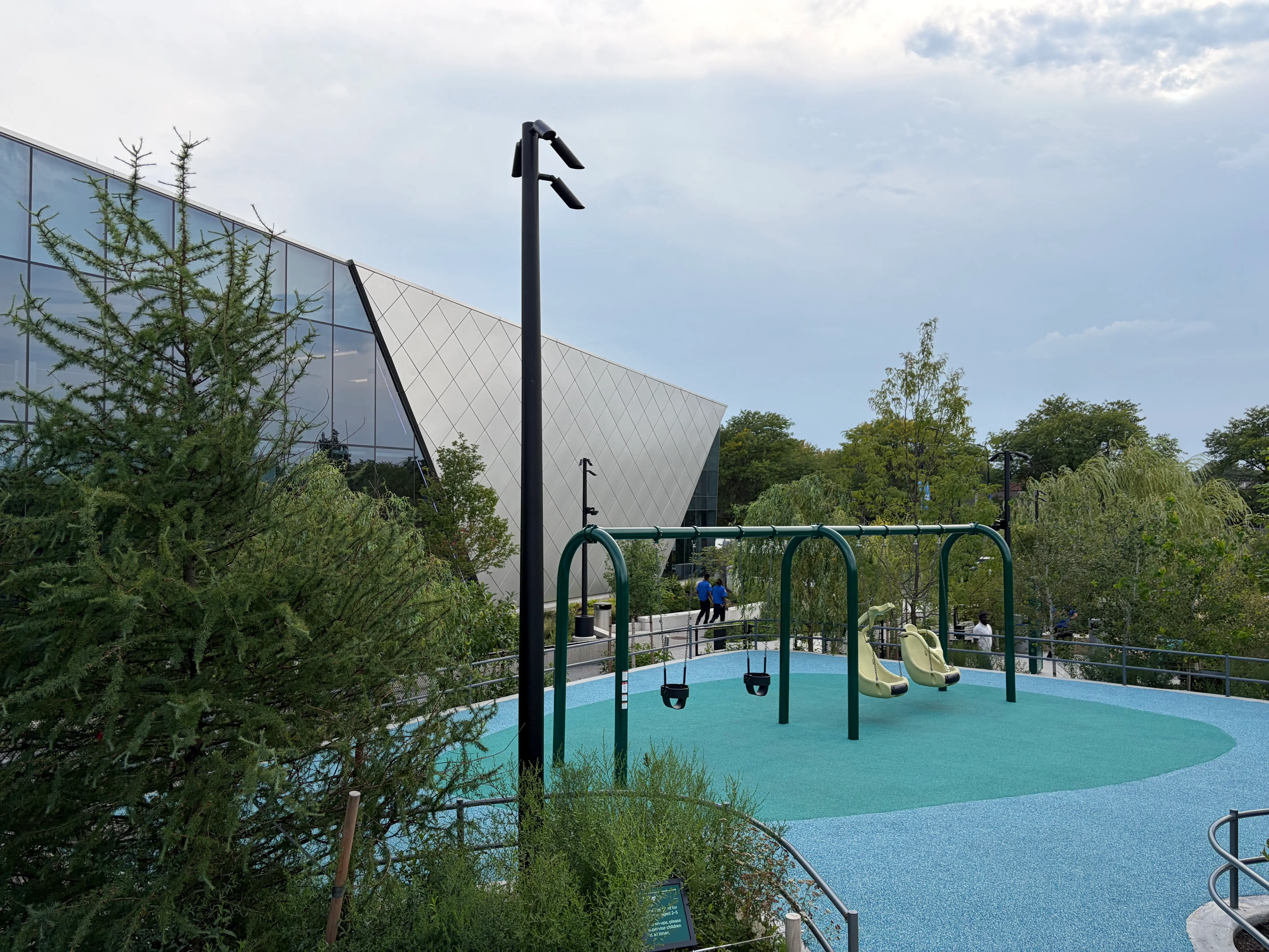 The playground shown with Home Court in the background on the Obama Presidential Center campus.