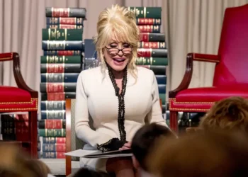 Dolly Parton contributed millions to humanitarian causes. Here’s how she made and spent her $450 million fortune.