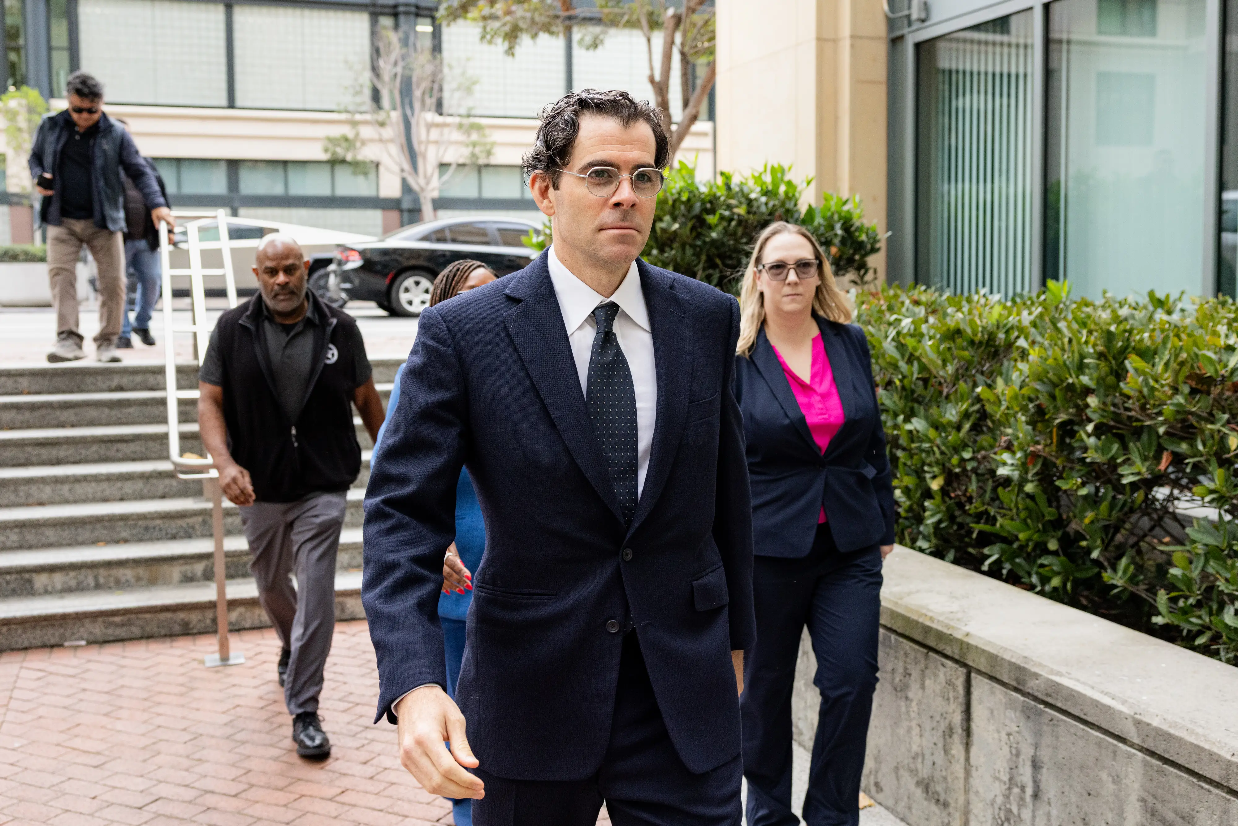 Adam Mosseri, head of Instagram at Meta Platforms Inc., arrives at the Ronald V. Dellums Federal Building & US Courthouse in Oakland, California, US, on Tuesday, Aug. 25, 2026. Meta Platforms Inc. is being sued by 29 states for allegedly deceiving the public by targeting children on Facebook and Instagram with technology designed to turn them into compulsive users and drive up advertising revenue. Photographer: Jason Henry/Bloomberg via Getty Images