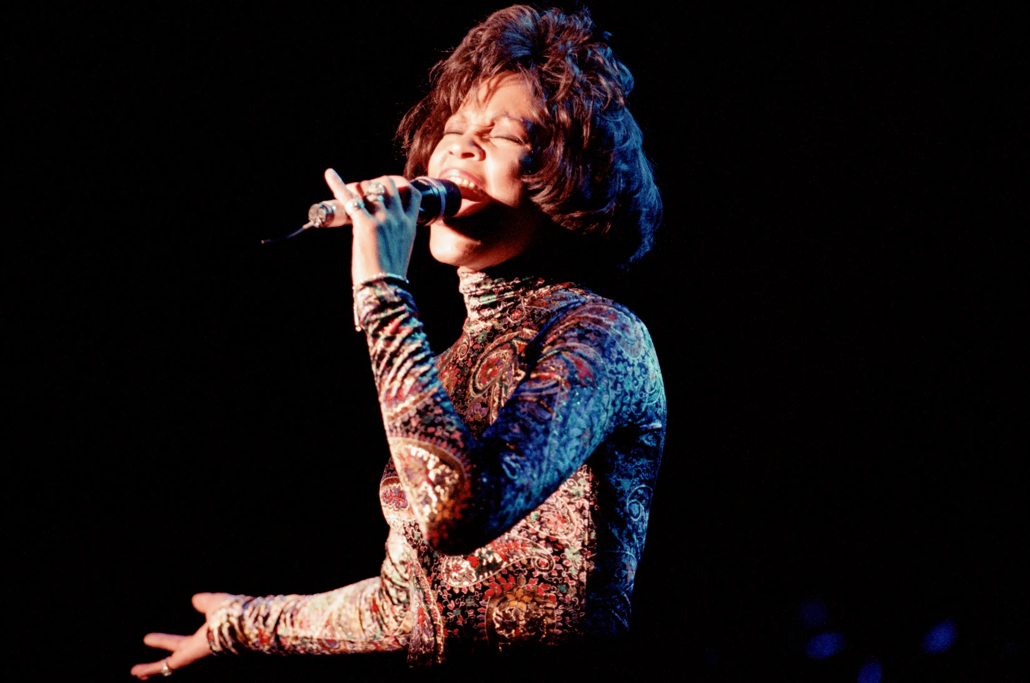 Whitney Houston performs during the 1993 Bodyguard World Tour.