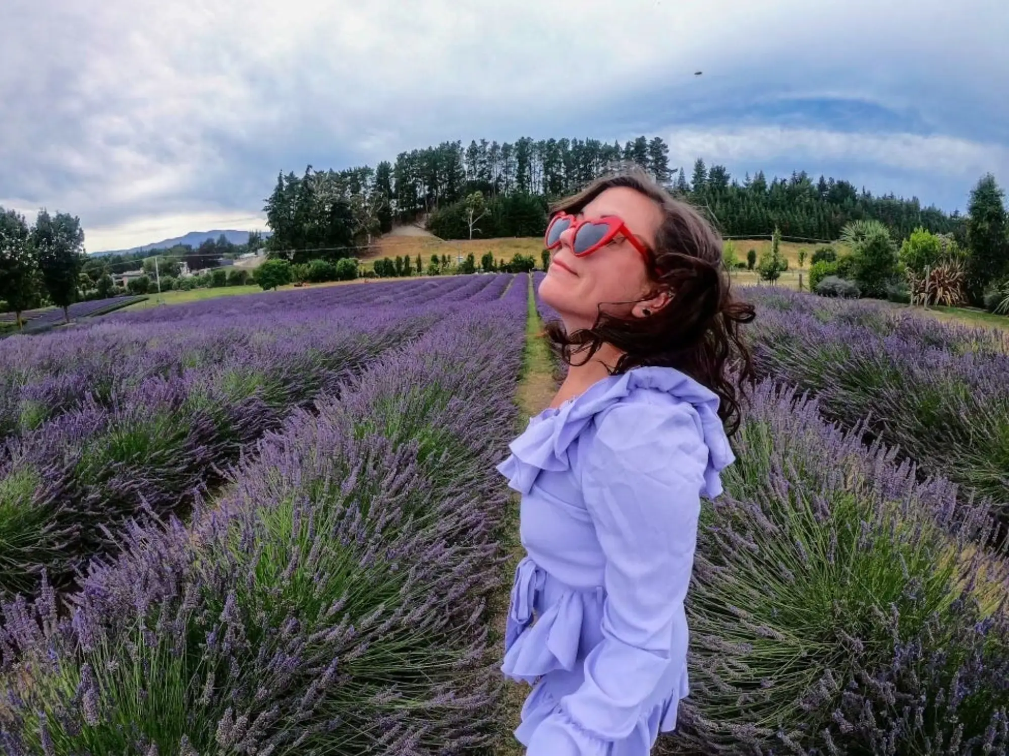 The author standing in fields of lavender in Wānaka, New Zealand.