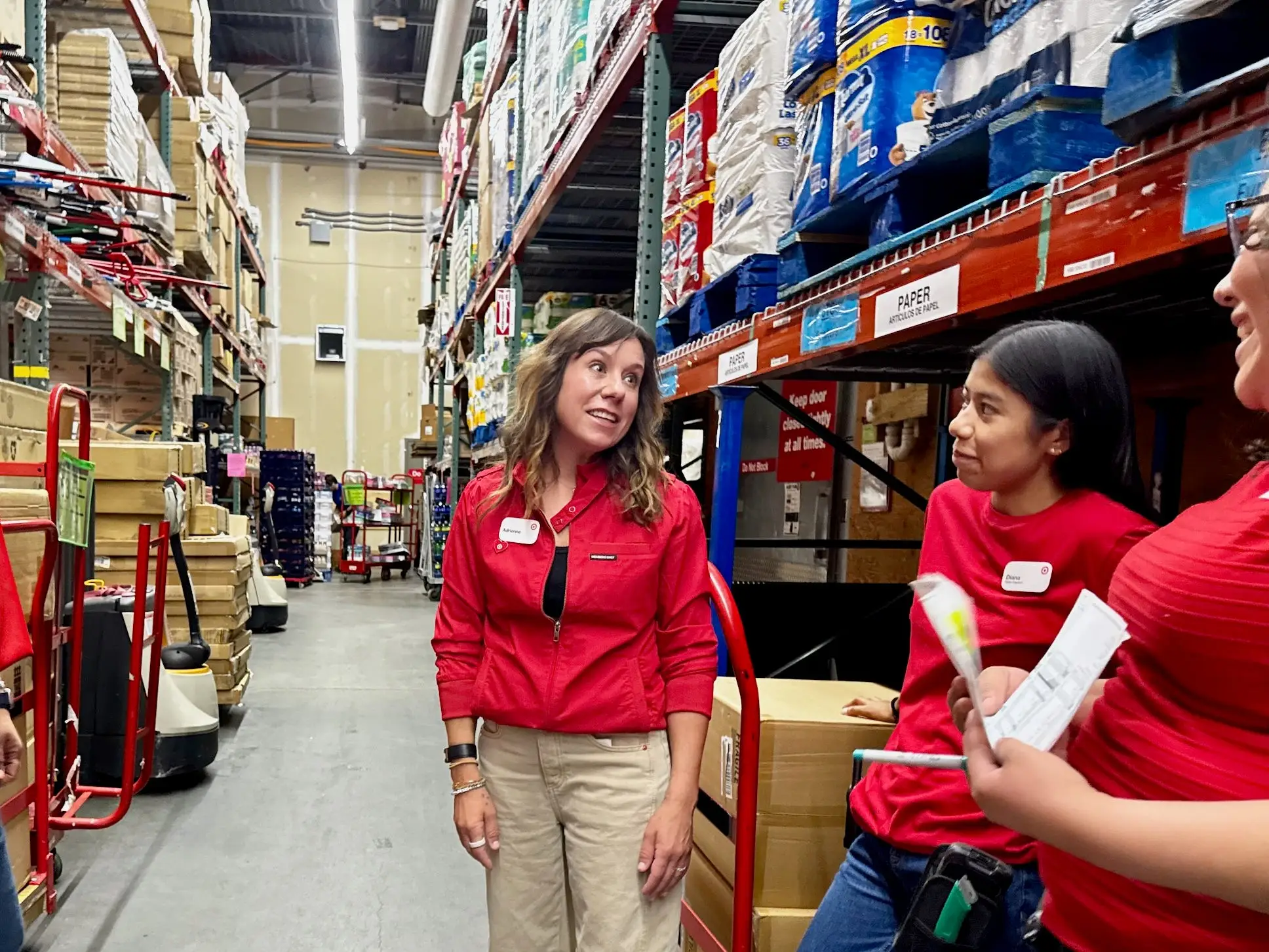 Target chief stores officer Adrienne Costanzo talks with employees