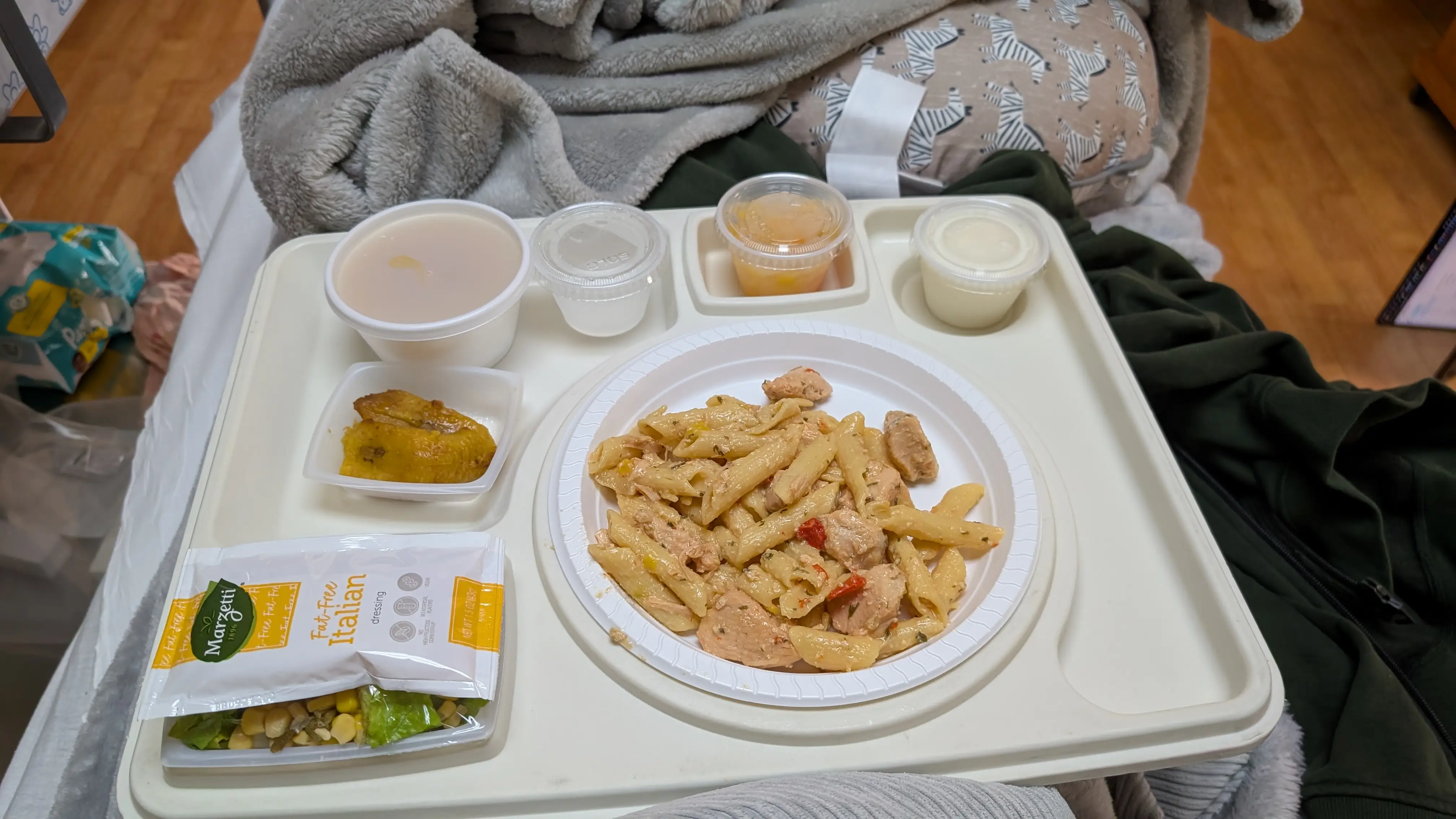 Food on tray in hospital room
