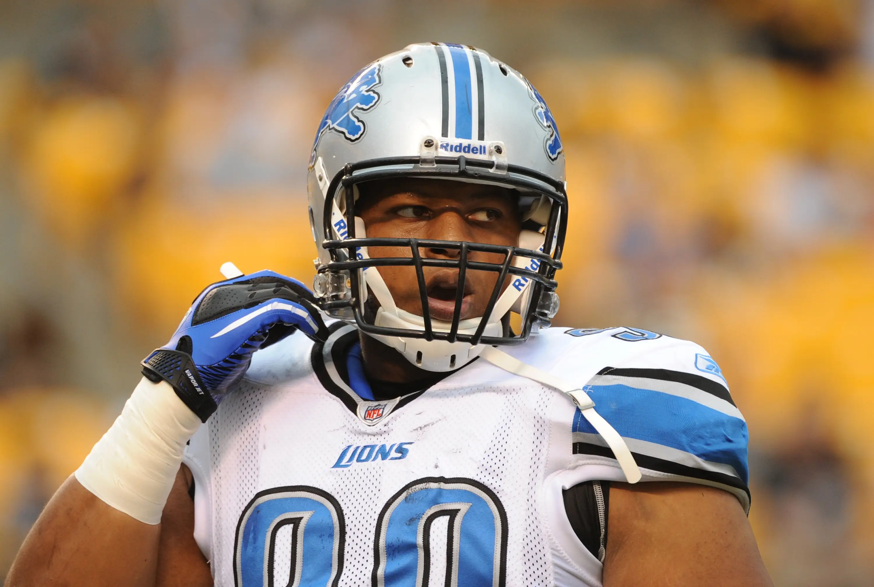 Ndamukong Suh in Lions NFL football gear.