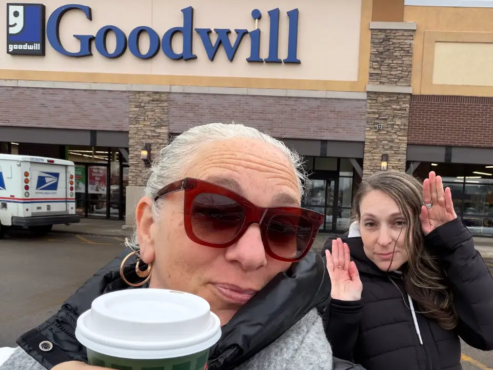 Amanda Leigh Lichtenstein and her sister in the parking lot of goodwill