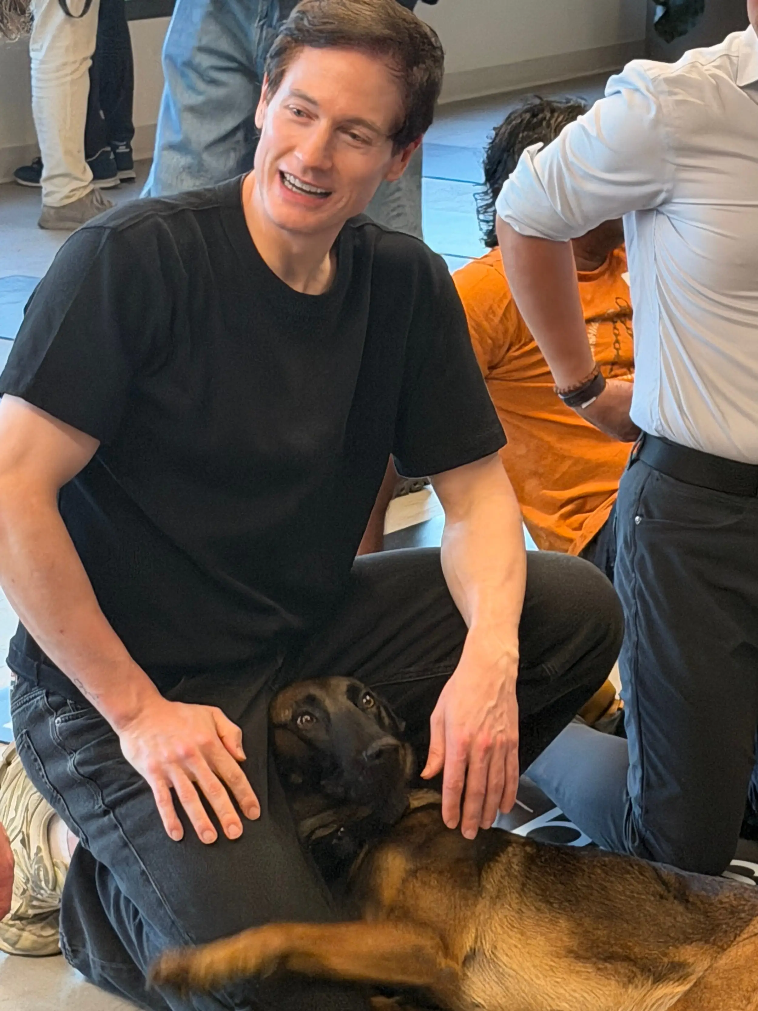 Bryan Johnson with his new dog, Katara, at a longevity event in San Francisco this week.