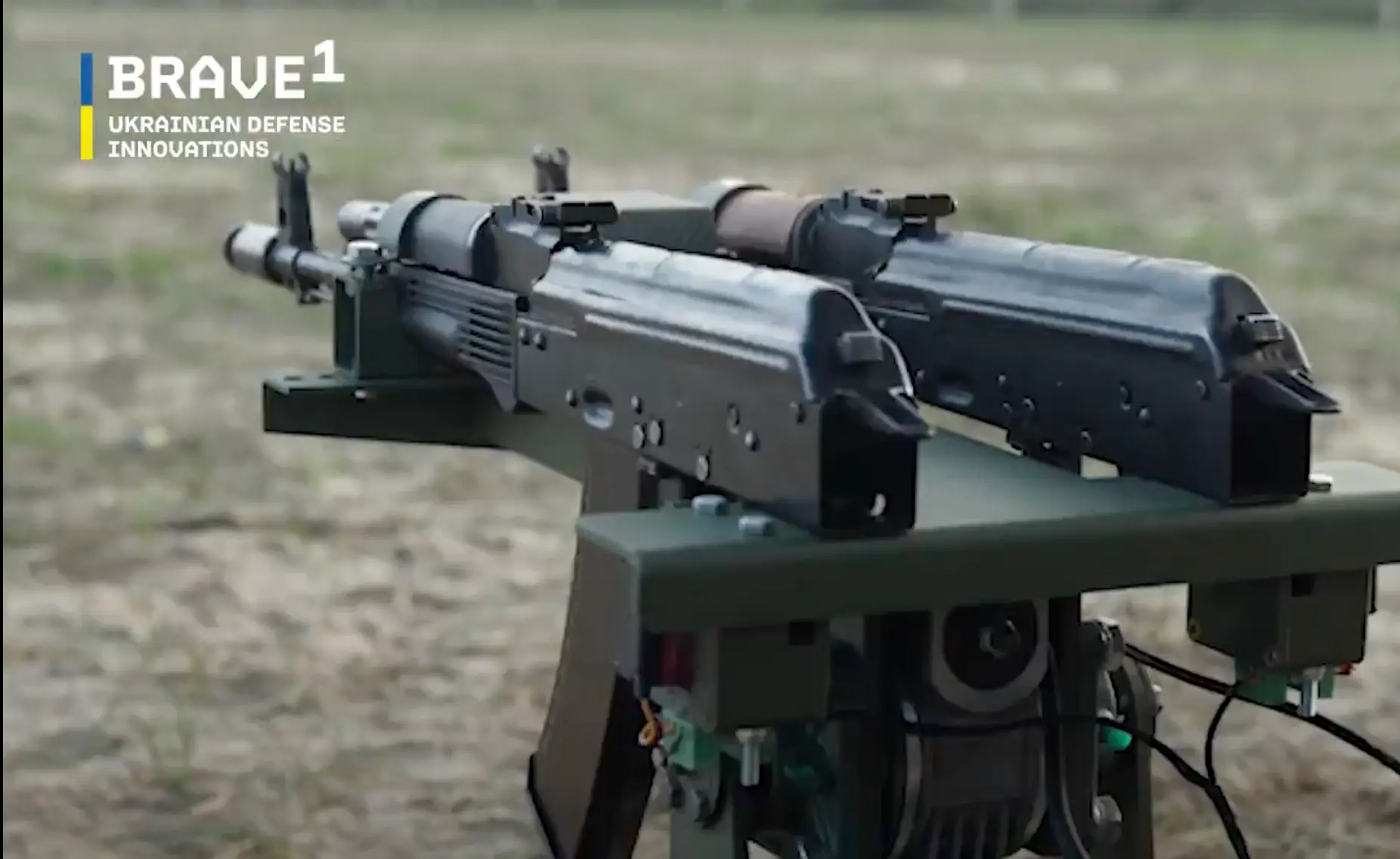 Two Kalashnikov rifles mounted on a turret frame.