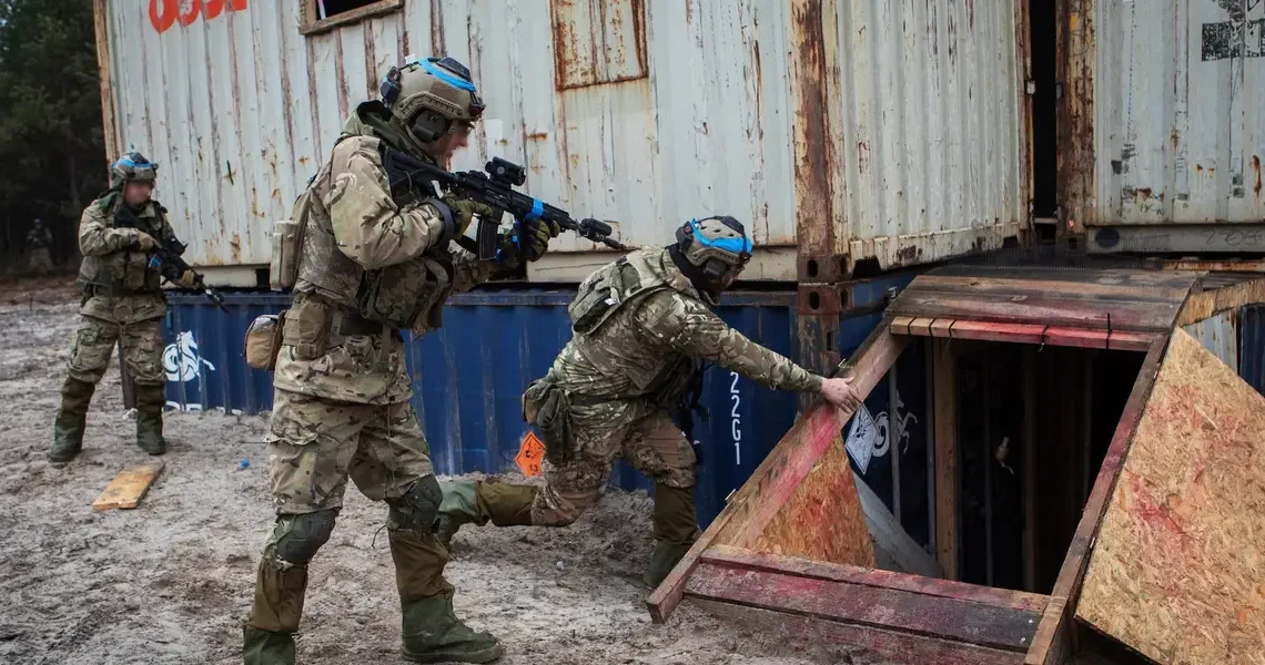 Ukrainian troops are training just beyond the war’s reach on NATO soil. Training leaders say that’s by design.