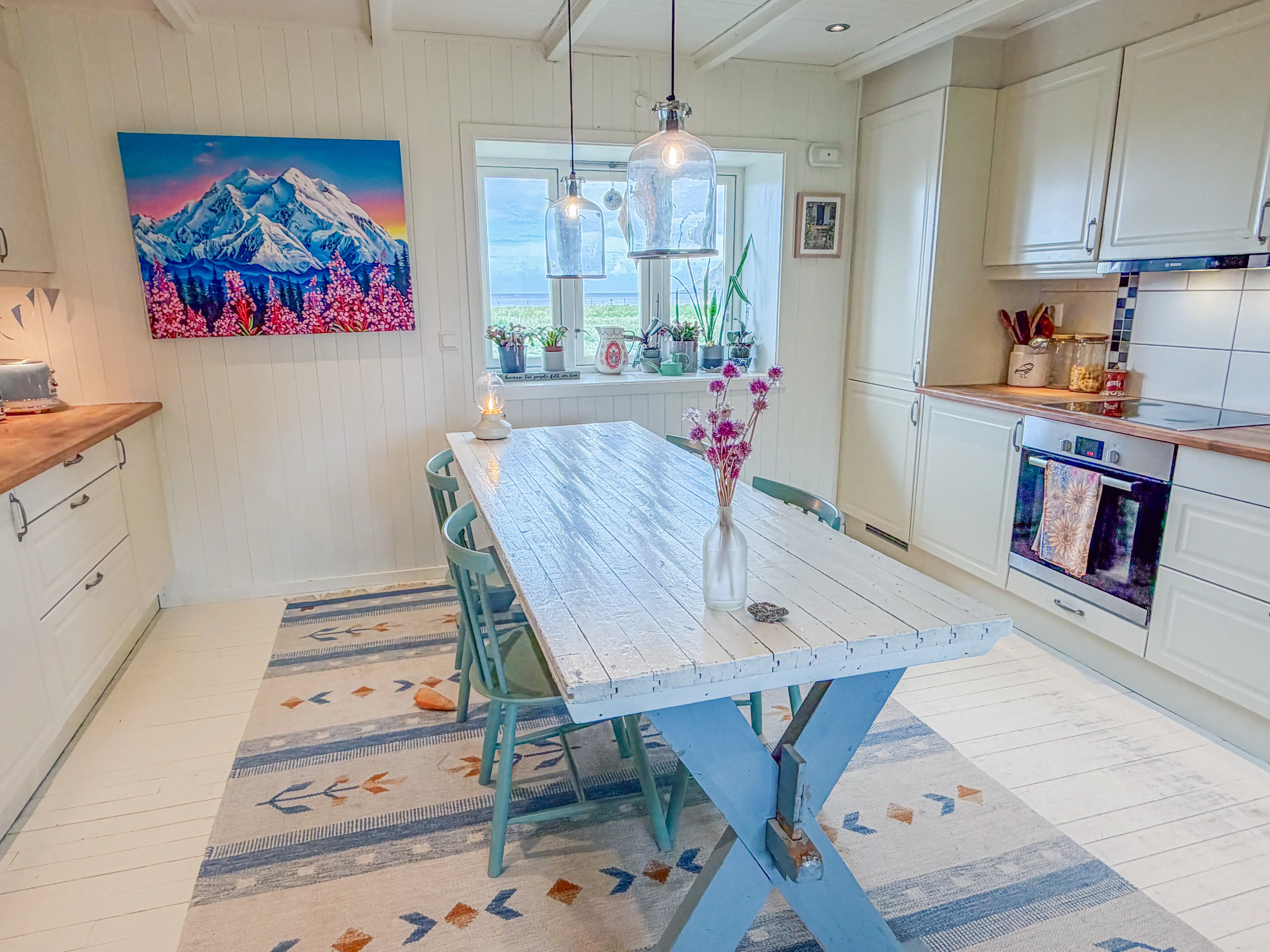 Kitchen with white wood walls, ceiling