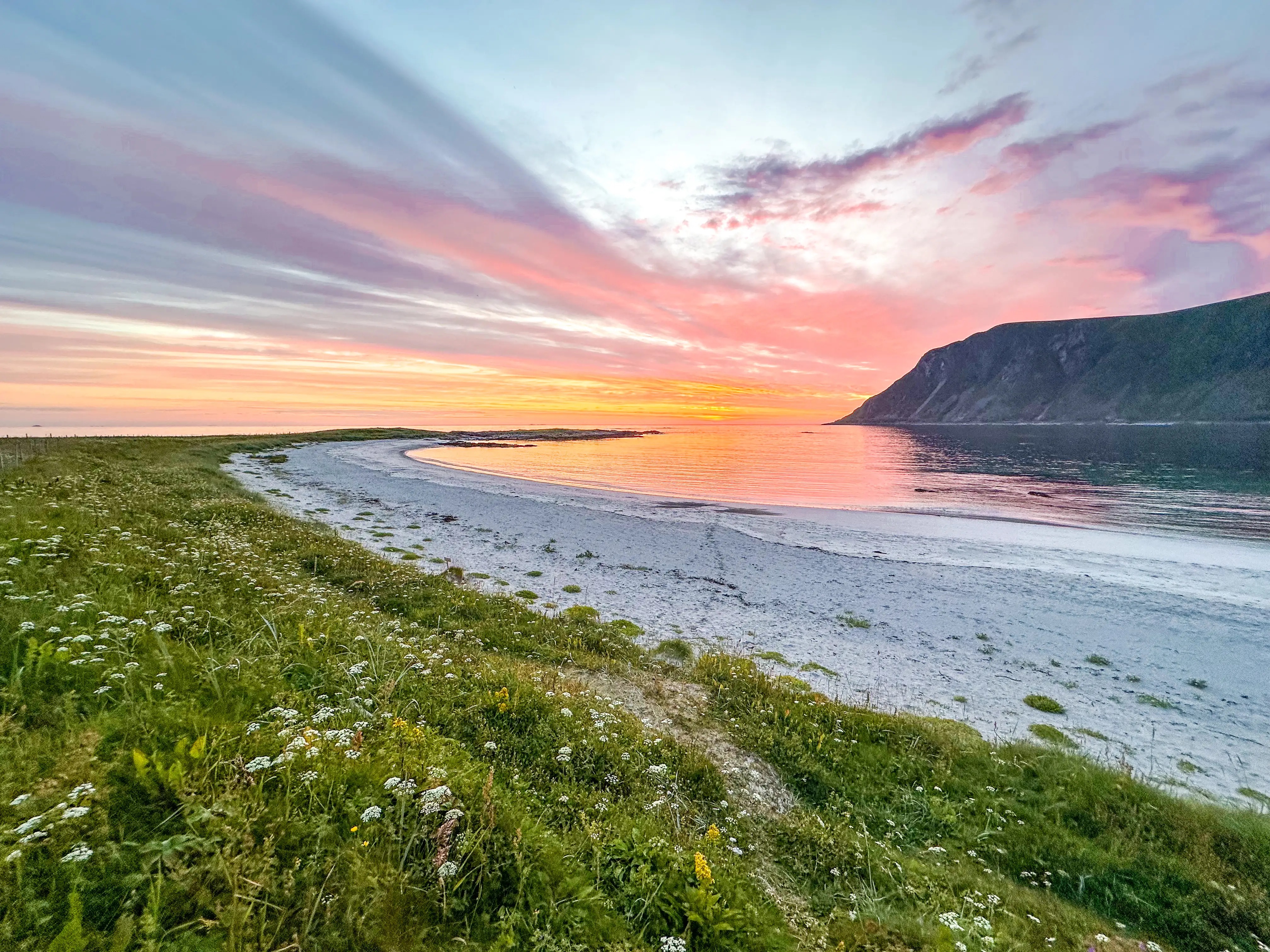 View of colorful sunset, water ,mountains