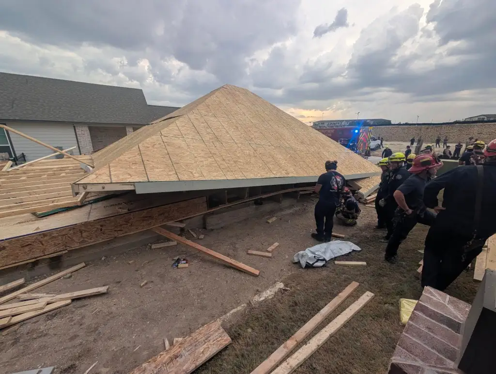 Four workers were at a home under construction when winds between 50 and 70 mph caused the home to collapse.