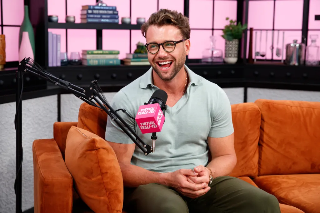 Harry Jowsey laughing during a Virtual Reali-Tea interview.