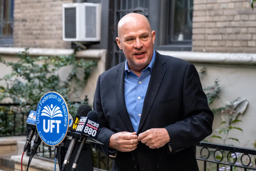 Mike Mulgrew, president of the United Federation of Teachers, speaks to reporters.