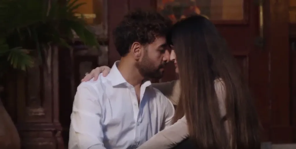 Mido and Debby from 90 Day Fiance looking at each other, almost touching foreheads.