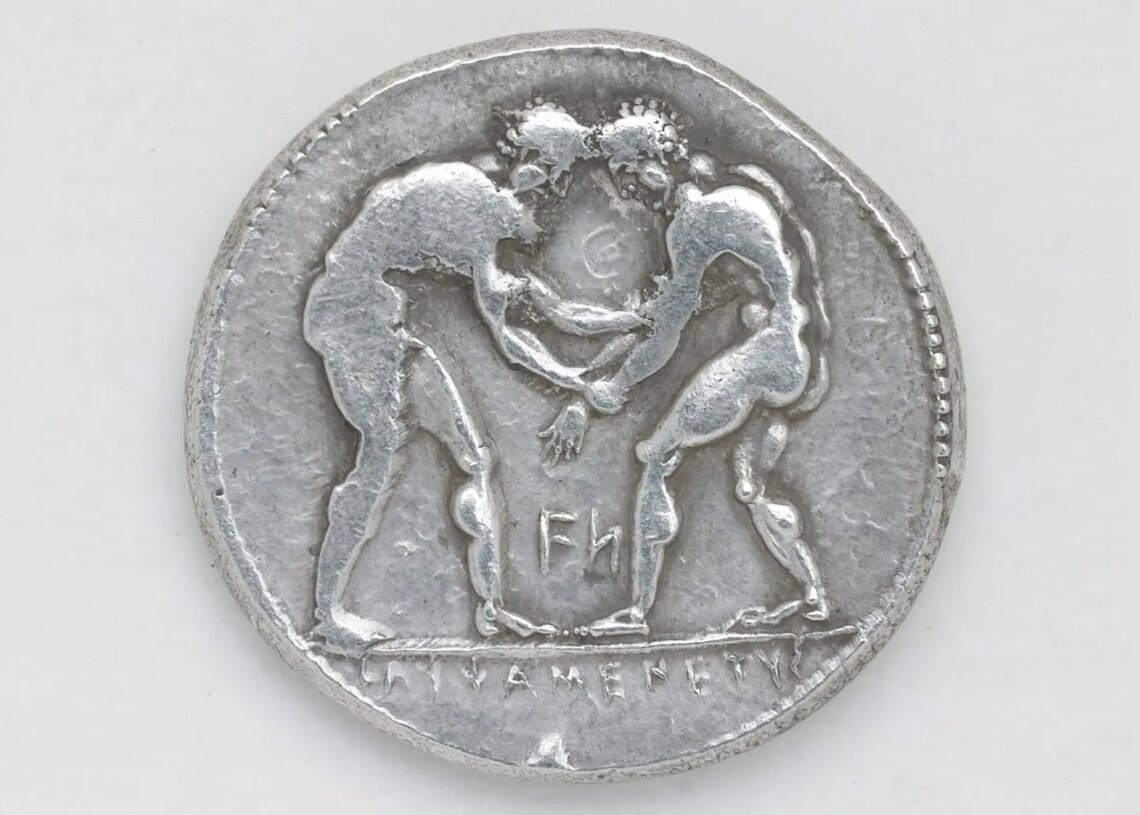 Archaeologists Found Coins Depicting Wrestlers Inside a 2,400-Year-Old Grave