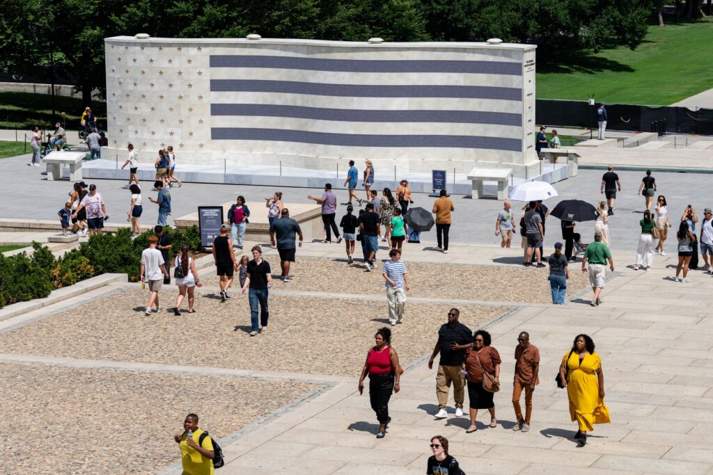 At new military monument, volunteers help faraway families connect