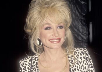 Dolly Parton’s Singular Style: How the Icon Made Excess Her Uniform