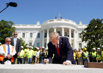 Trump shows off his new helipad, brags about construction projects