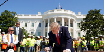 Trump shows off his new helipad, brags about construction projects