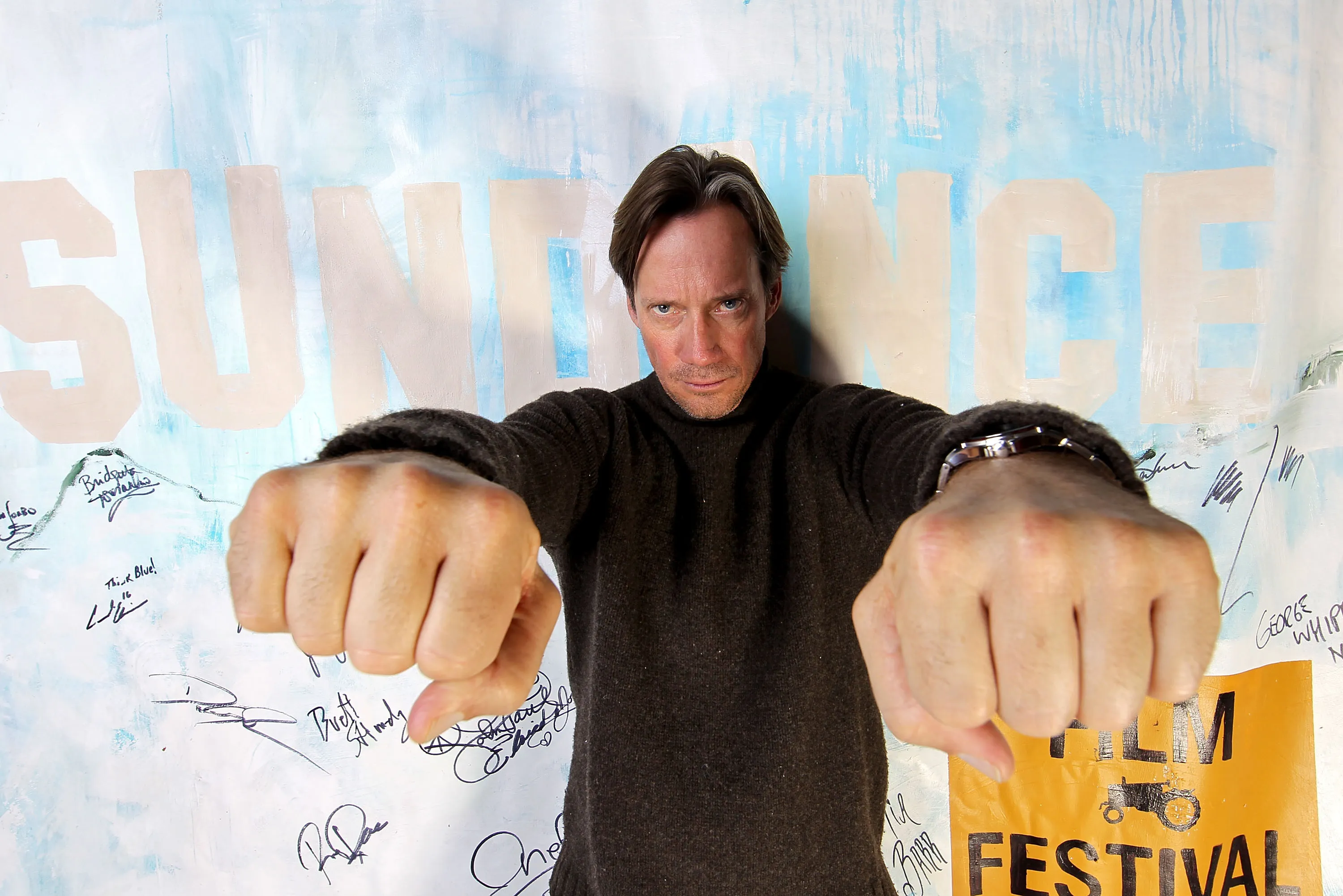 Kevin Sorbo making thumbs-down gestures at the 2011 Sundance Film Festival.
