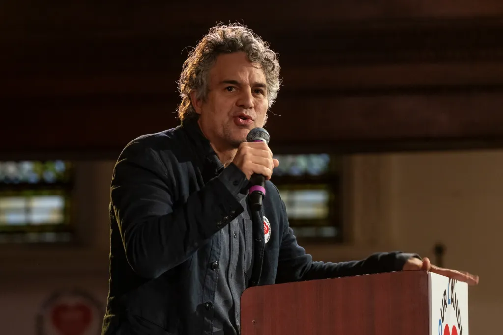 Actor Mark Ruffalo speaking into a microphone.