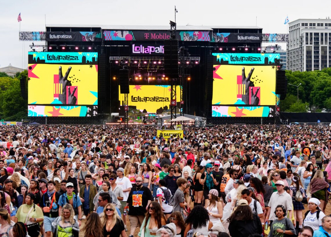 WATCH: Two-Woman Lollapalooza Mud Pit Brawl Takes Steamy Turn As the Crowd Cheers Them On