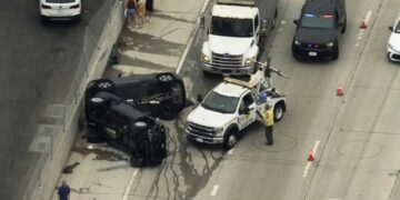 Rush hour mayhem on major California freeway as two cars flip causing mass delays