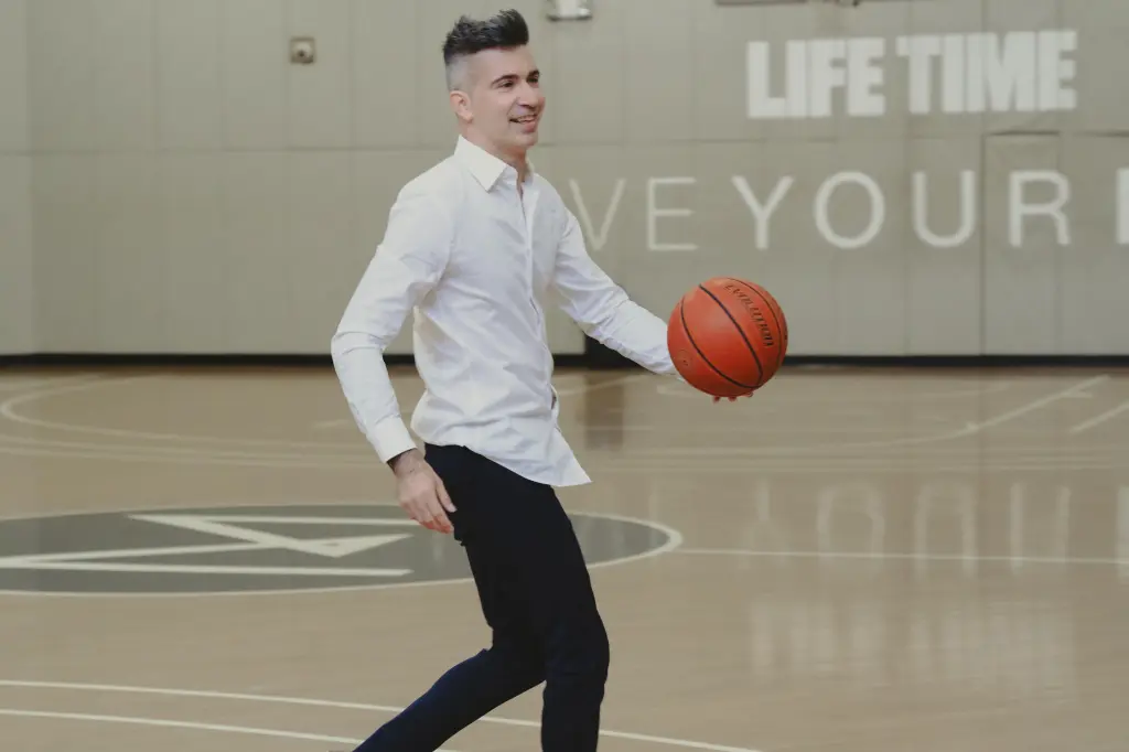 Yevgeny dribbles a basketball