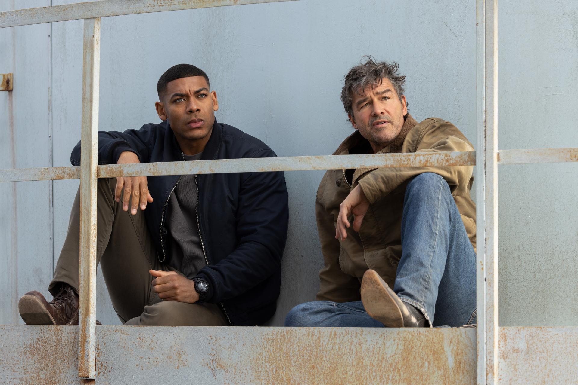 Aaron Pierre and Kyle Chandler in