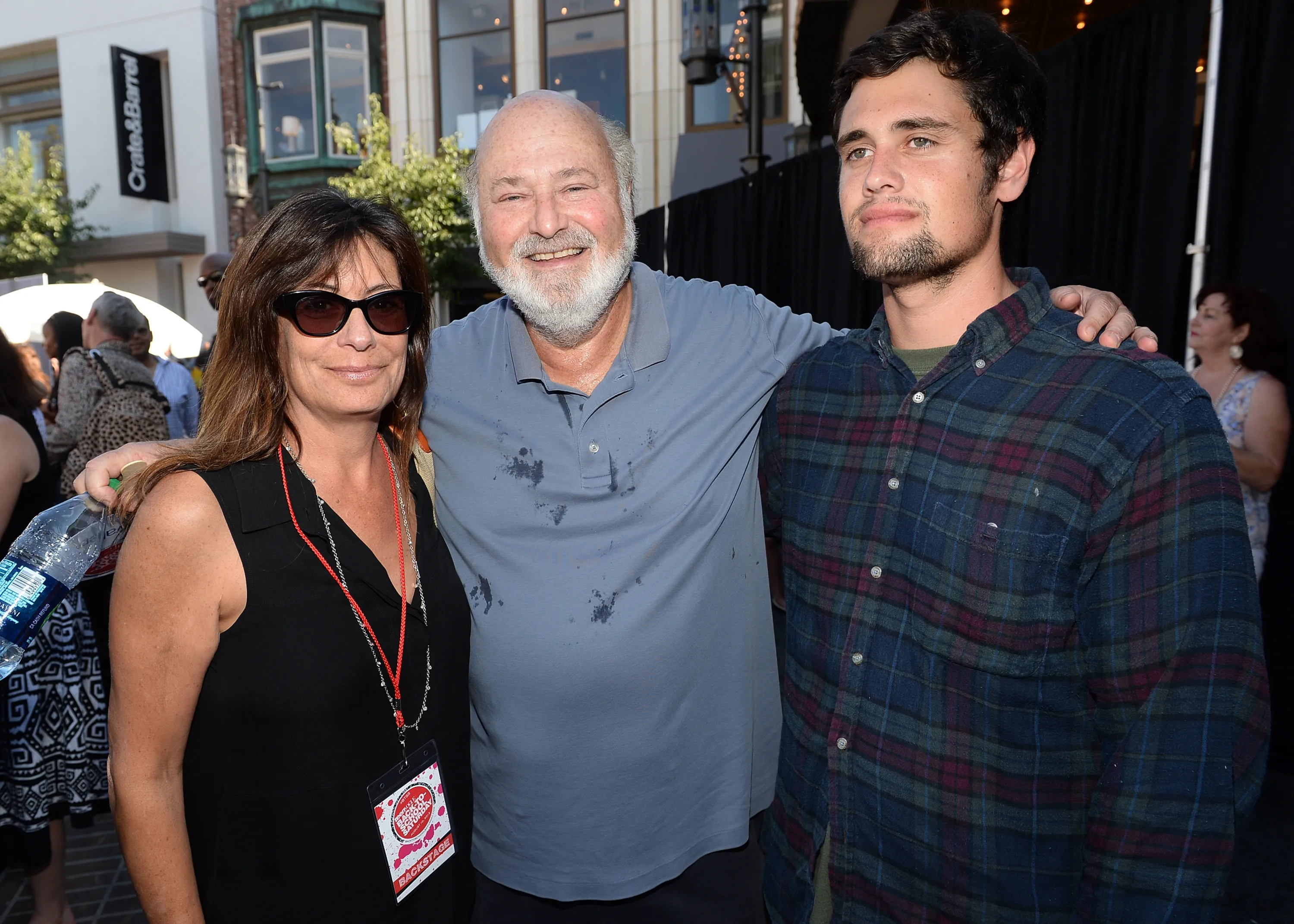 Rob Reiner, his wife Michele Singer, and son Nick Reiner, smiling together at an event.