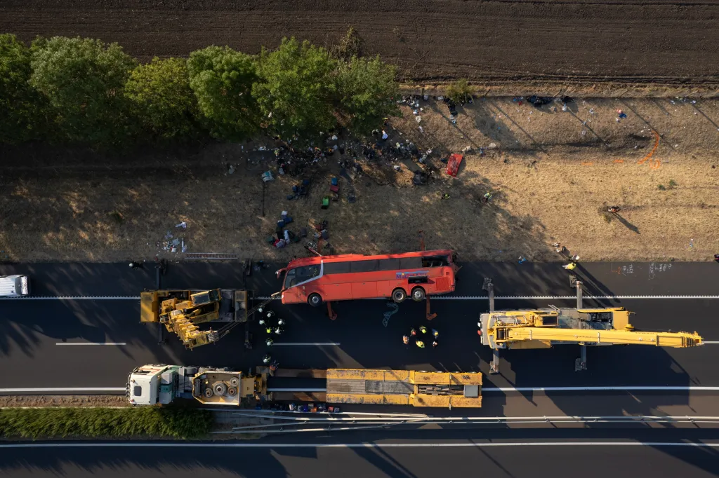 Aerial view of emergency services at the scene of a tourist bus accident on the M3 motorway in Hungary.