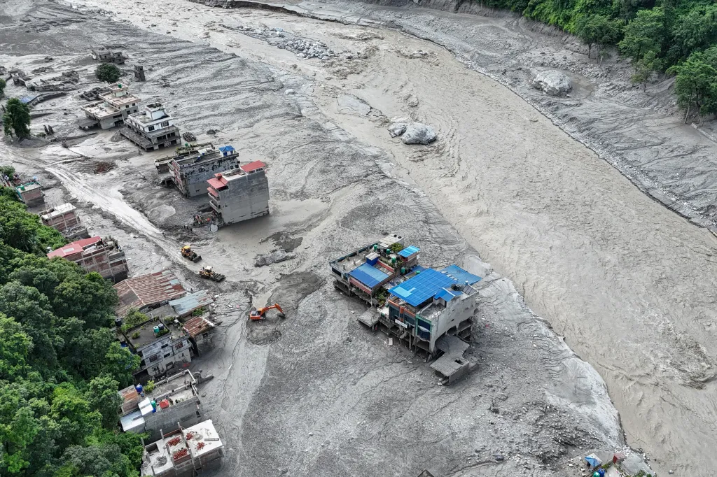Rescue teams scoured devastated zones for more than 1,300 people missing a day after flash floods and landslides along the Nepal-Tibet border killed at least 273, sweeping away entire villages. (AFP or licensors)