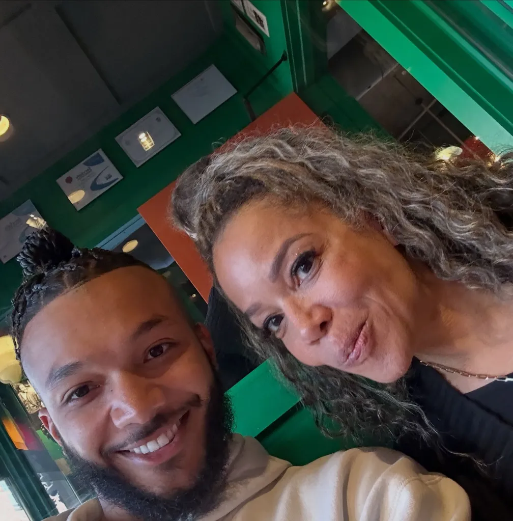 Sunny Hostin and her son Gabriel Hostin smiling.