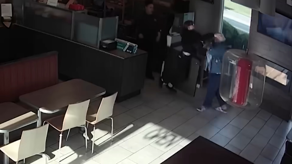 Security camera footage showing a physical altercation between two women in a Tim Hortons.