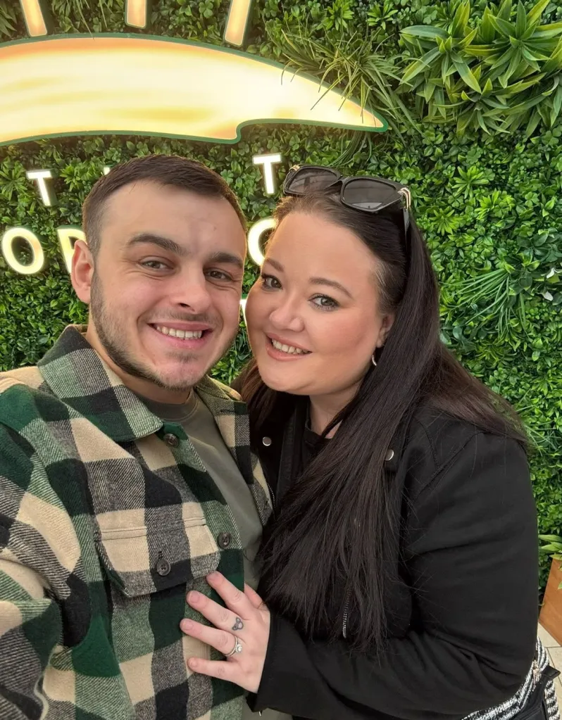 Amber Williams and her husband smiling.