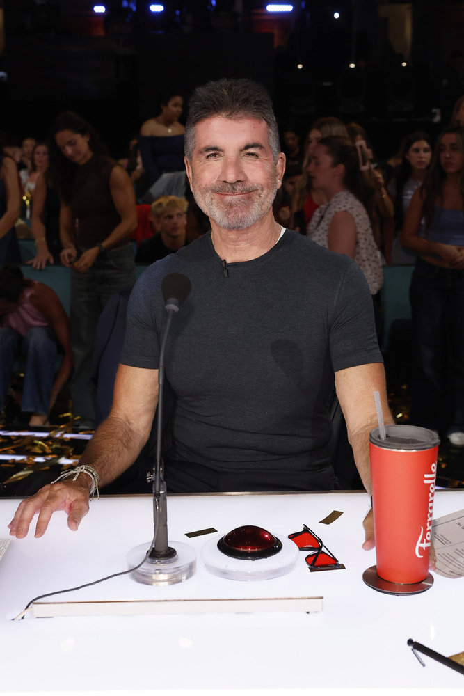 Simon Cowell at the judges' table during America's Got Talent.