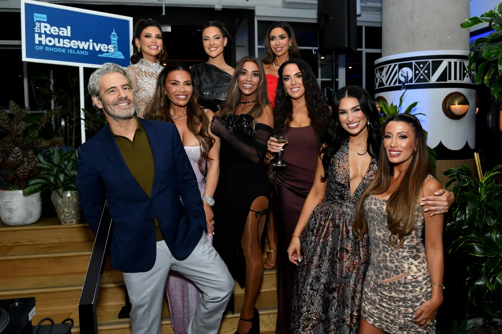 Andy Cohen and the cast of The Real Housewives of Rhode Island at a screening event.